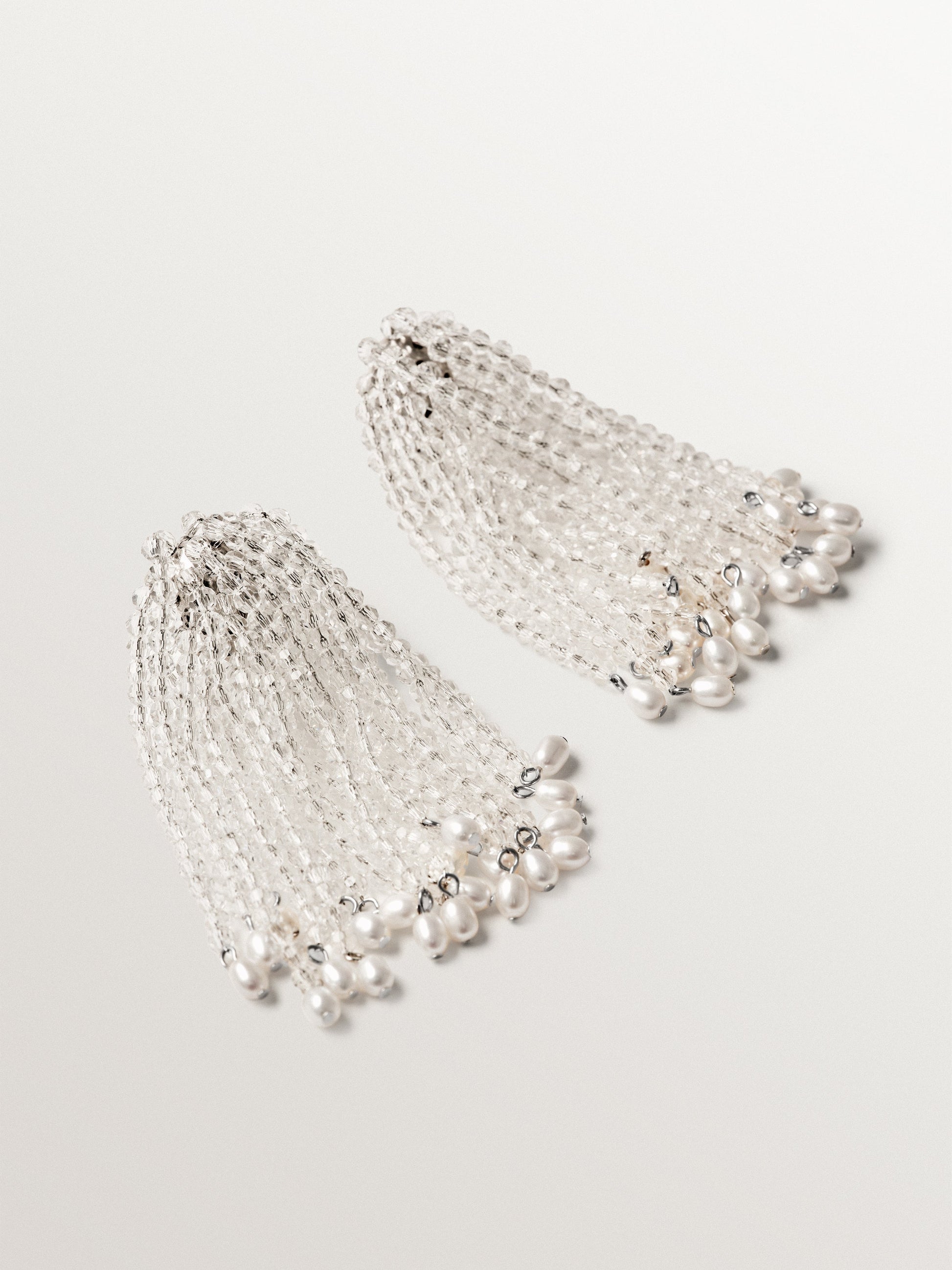 Cascading slopes with baroque pearls and crystals