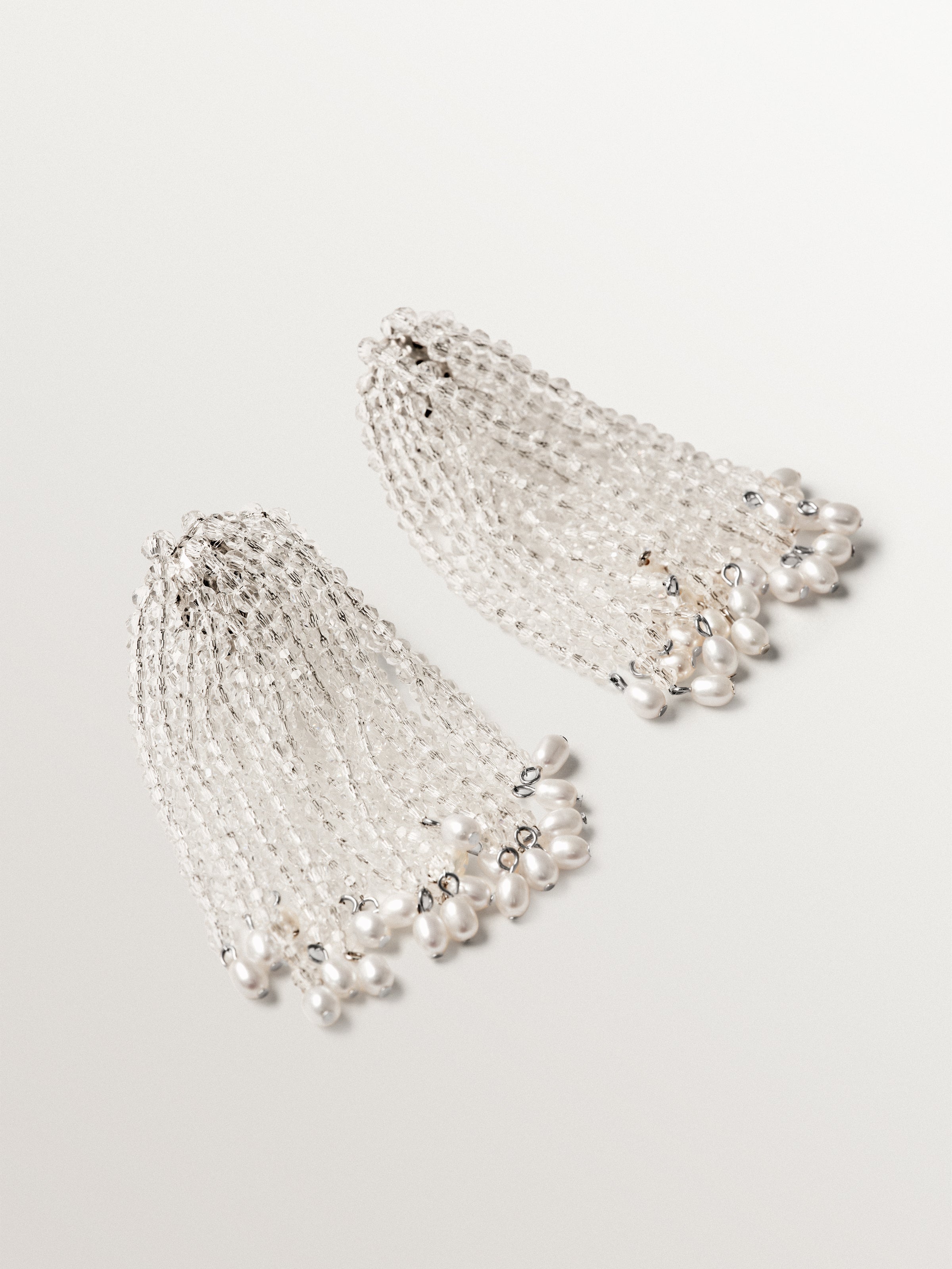 Cascading slopes with baroque pearls and crystals