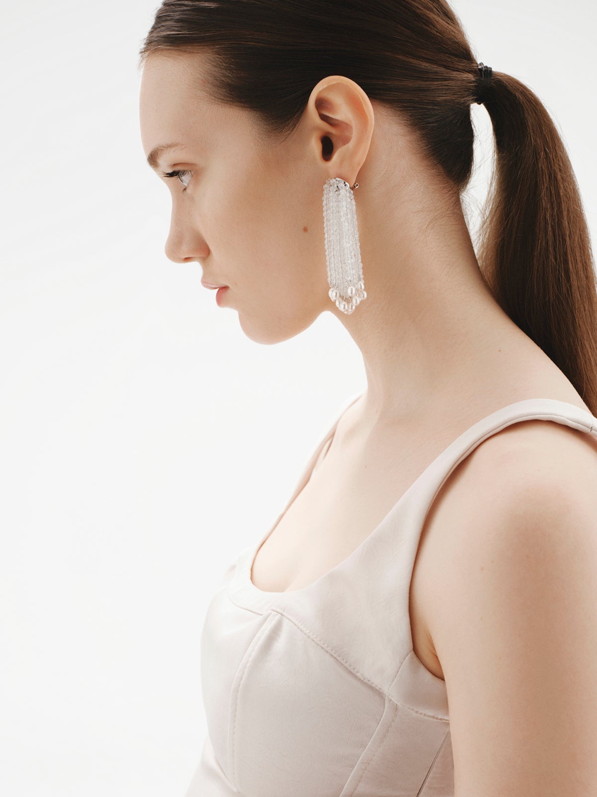 Cascading slopes with baroque pearls and crystals