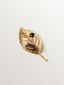 Yellow gold plated brooch-charm with crystals and leaf and insect shape