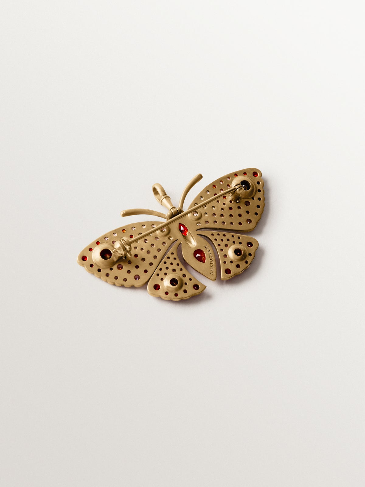 Brooch-charm with crystals and insect shape