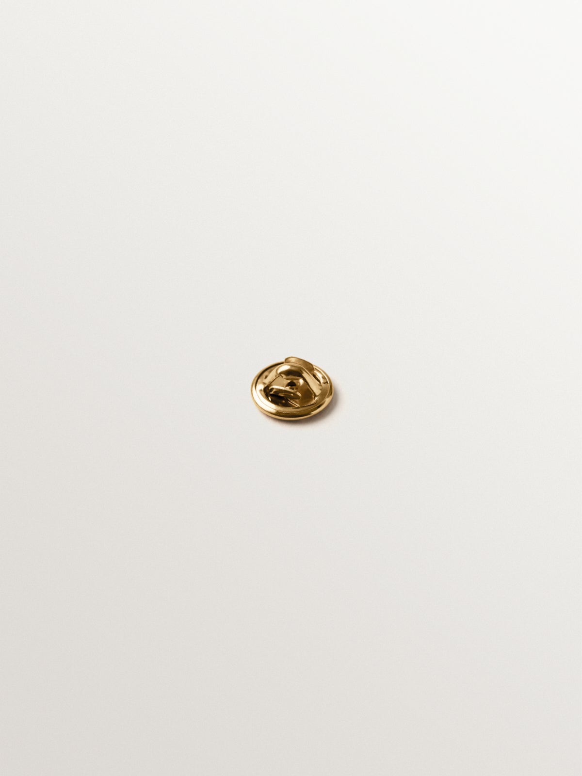 Yellow gold-plated pin with crystal and beetle shape