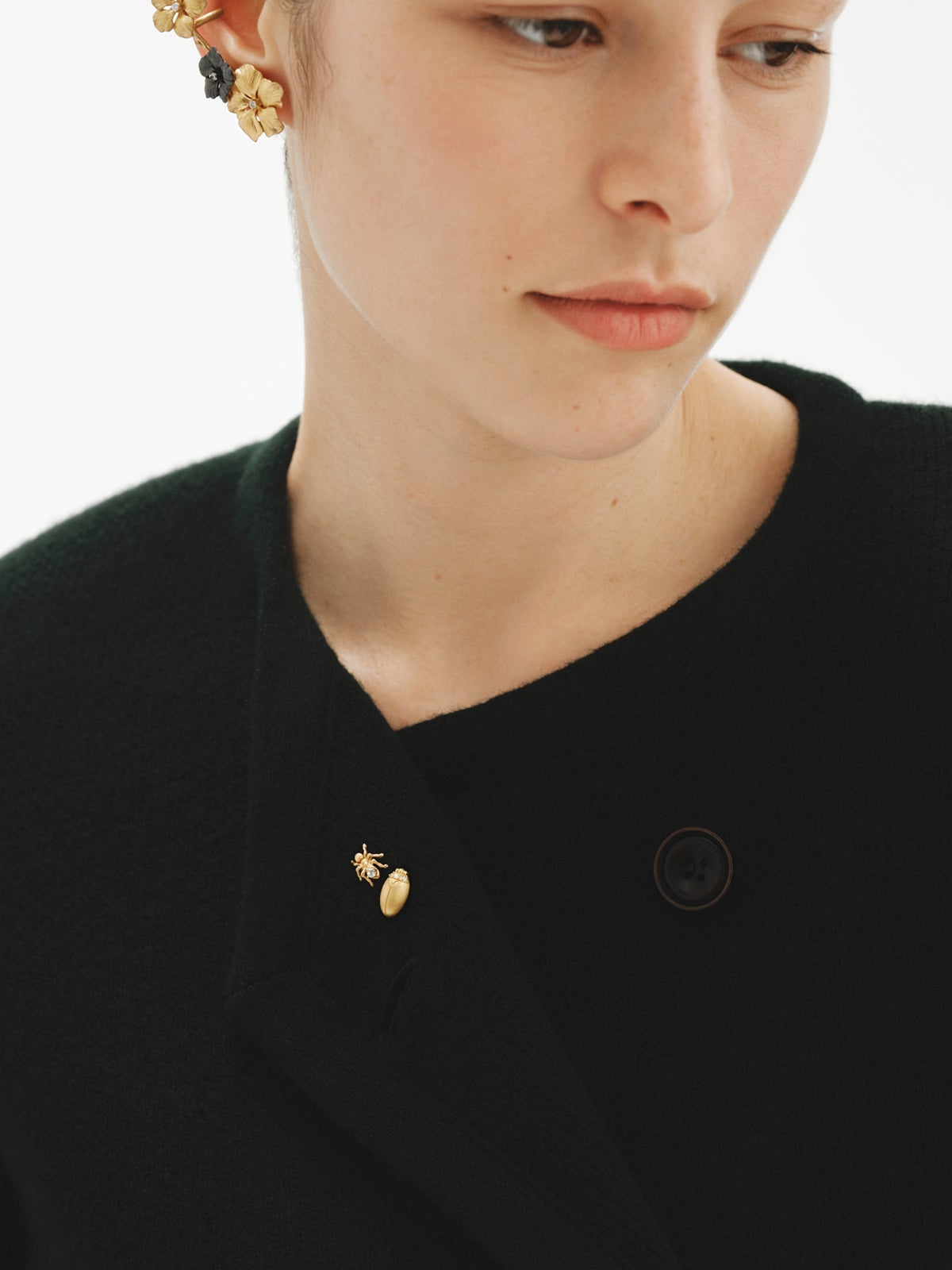 Yellow gold-plated pin with crystal and beetle shape