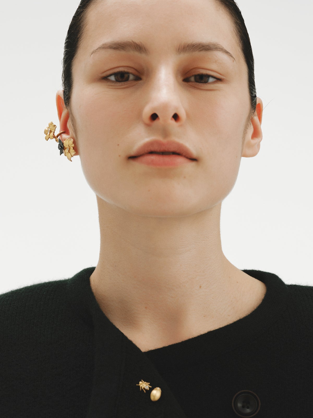 Yellow gold plated pin with crystal and ant shape