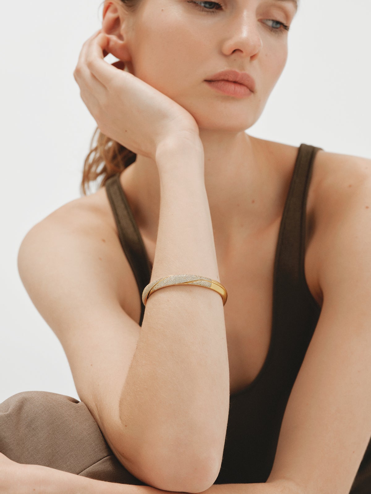 Yellow gold-plated gimmel bracelet with crystal pavé