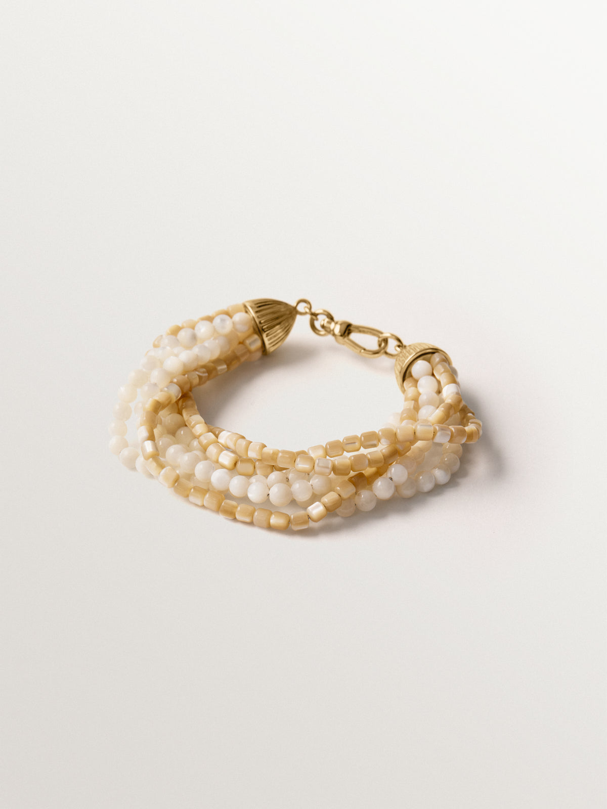 Yellow gold-plated bracelet with mother-of-pearl beads