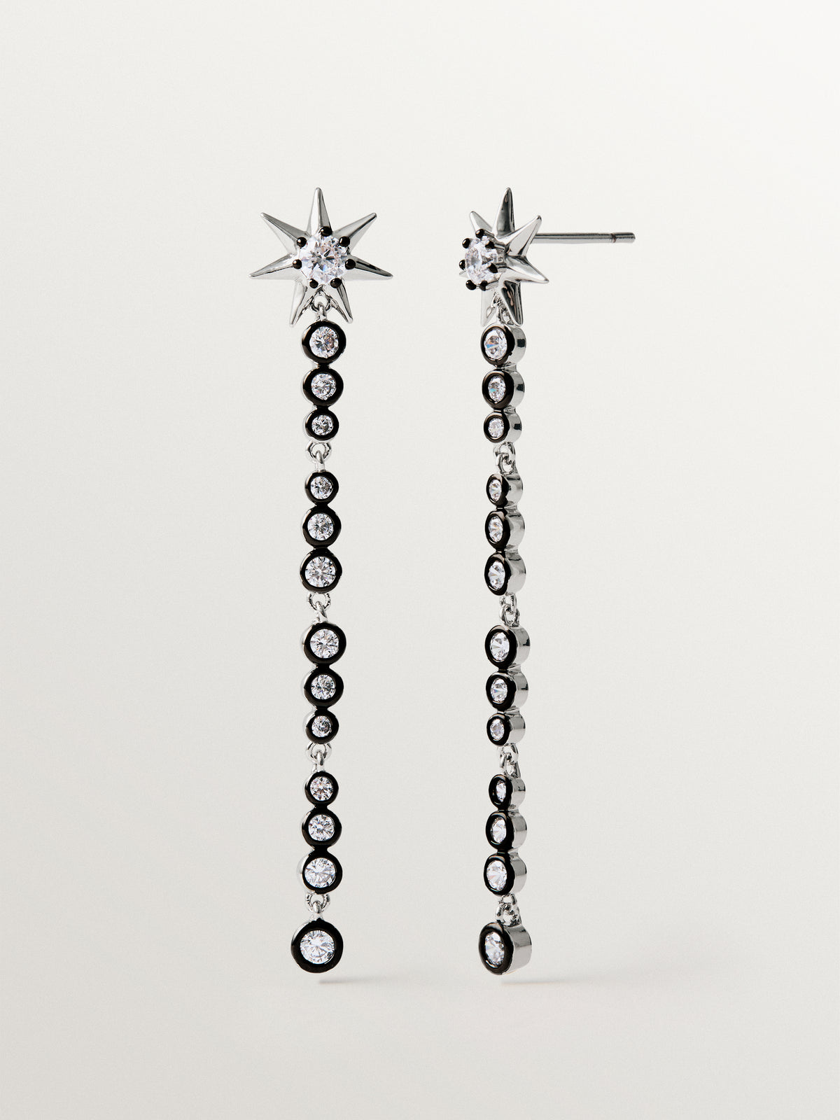 Two-tone long earrings with crystals and stars