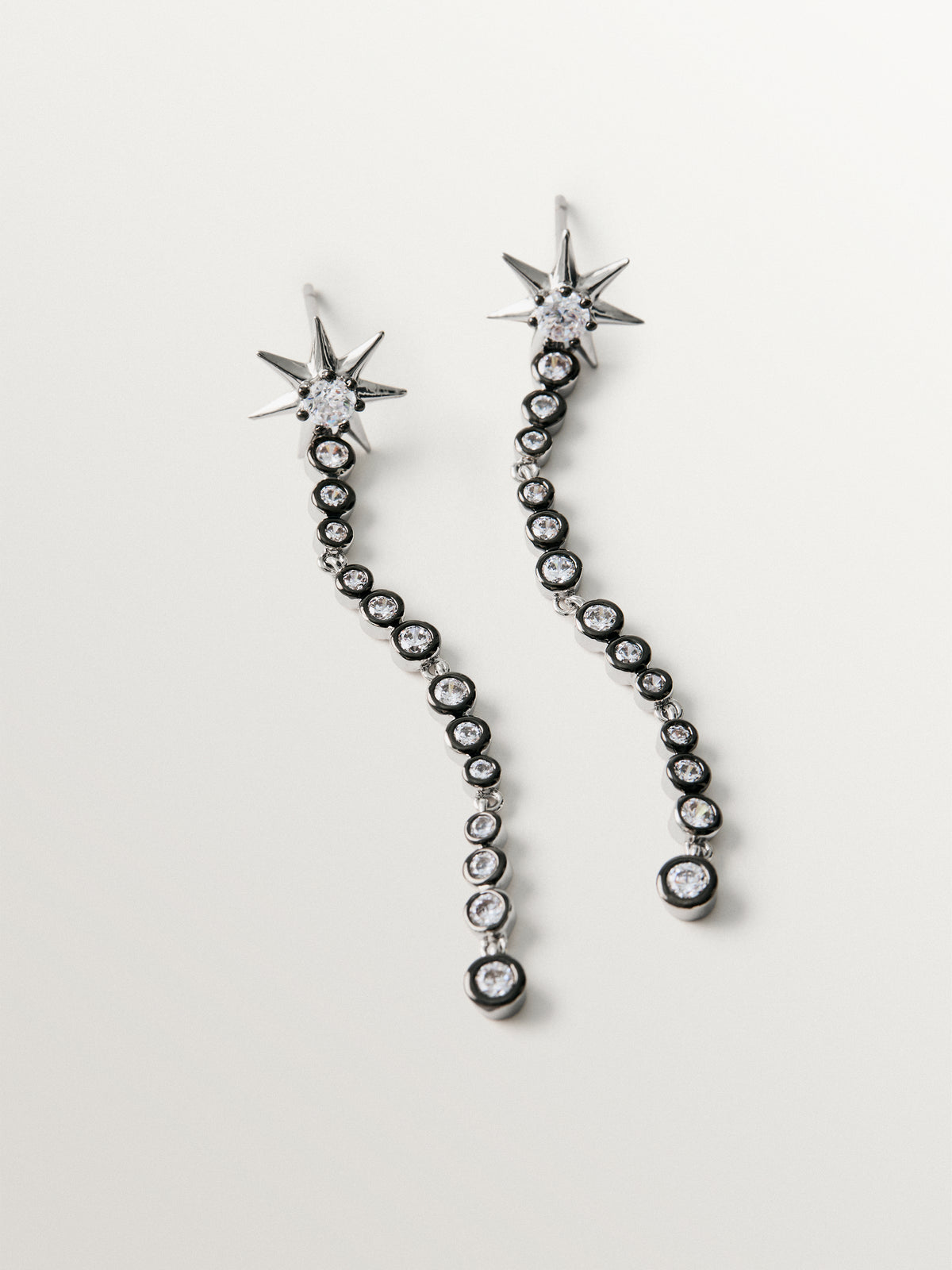Two-tone long earrings with crystals and stars