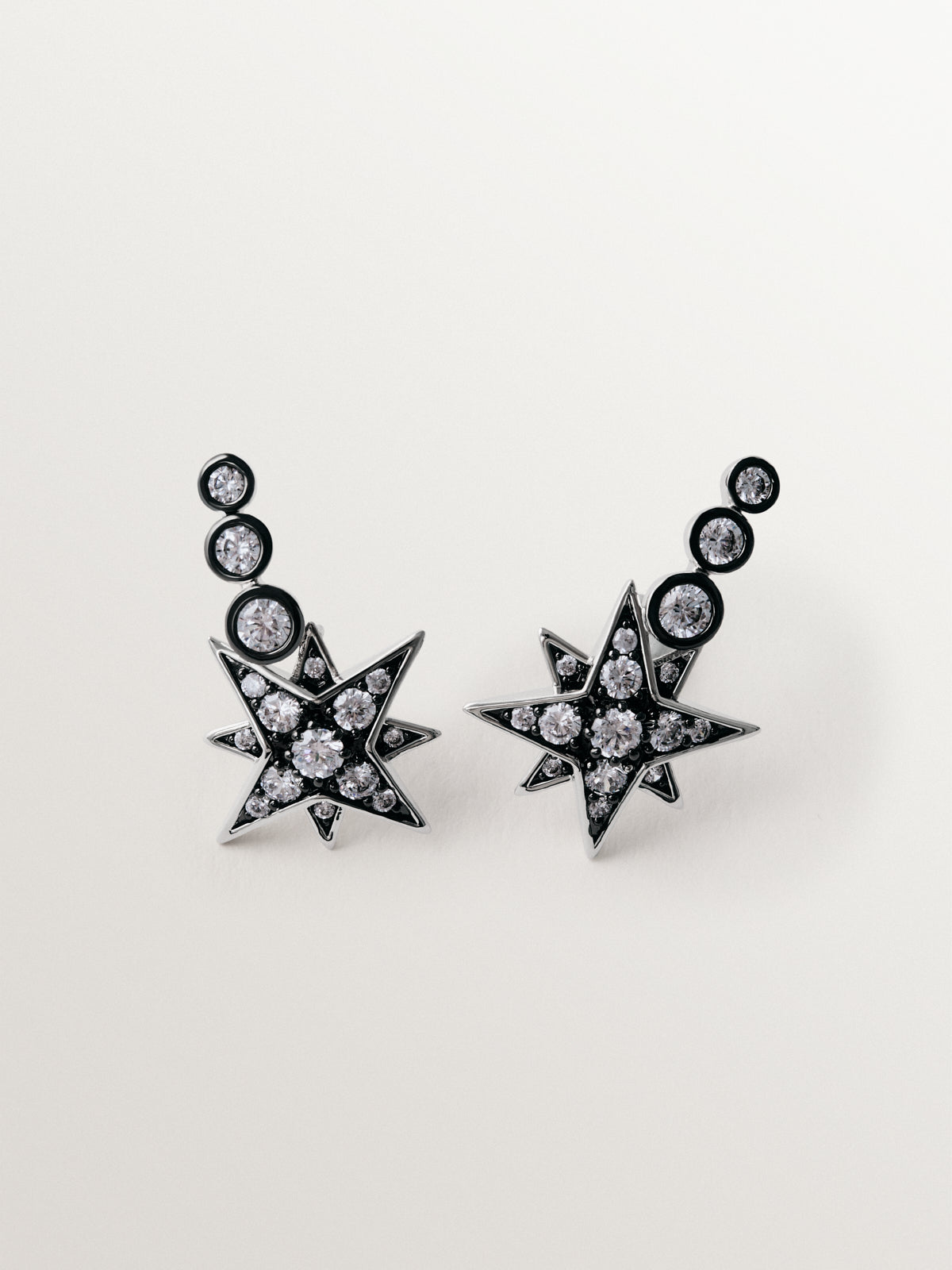 Two-tone ear climber earrings with star-shaped crystals