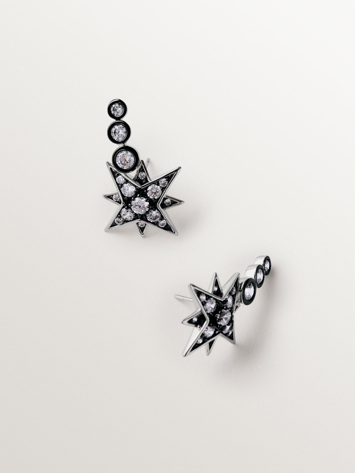 Two-tone ear climber earrings with star-shaped crystals