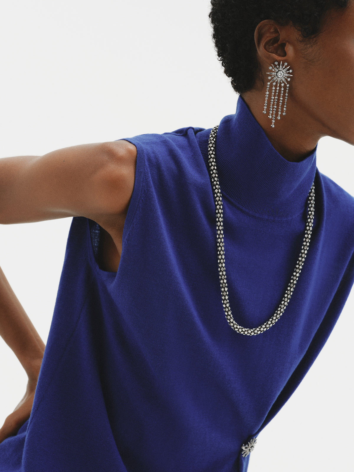 Two-tone cascading earrings with crystals and stars