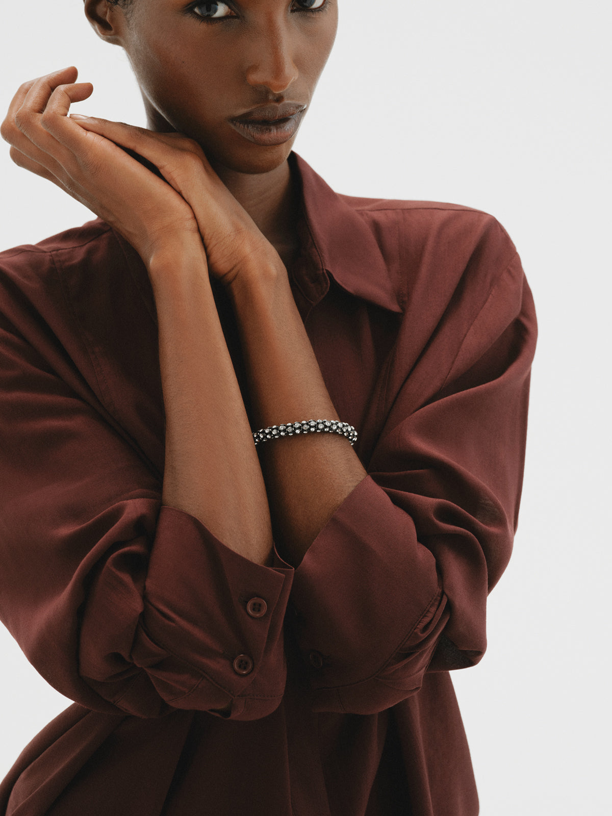 Tube-shaped bracelet with crystals