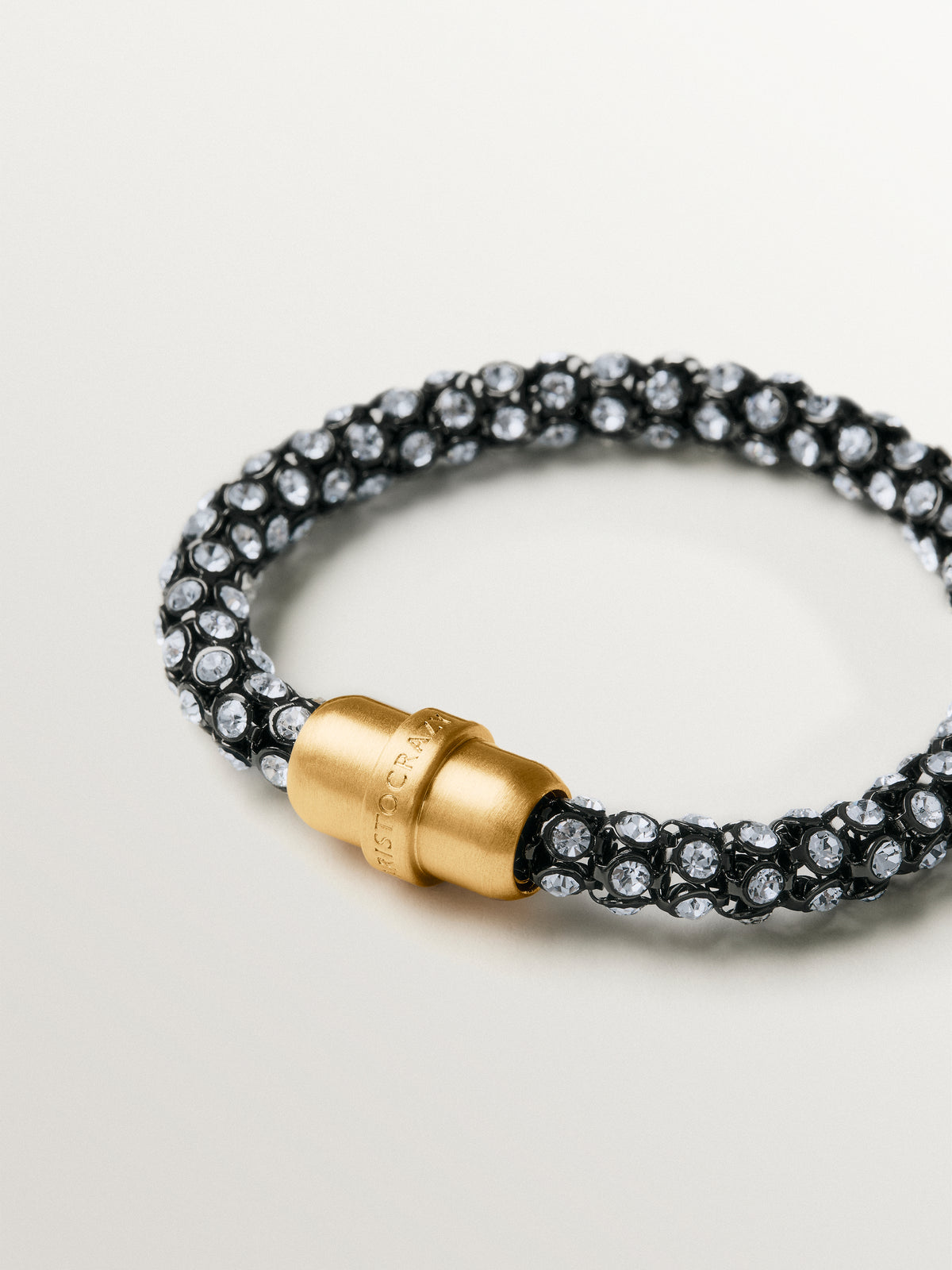 Tube-shaped bracelet with crystals