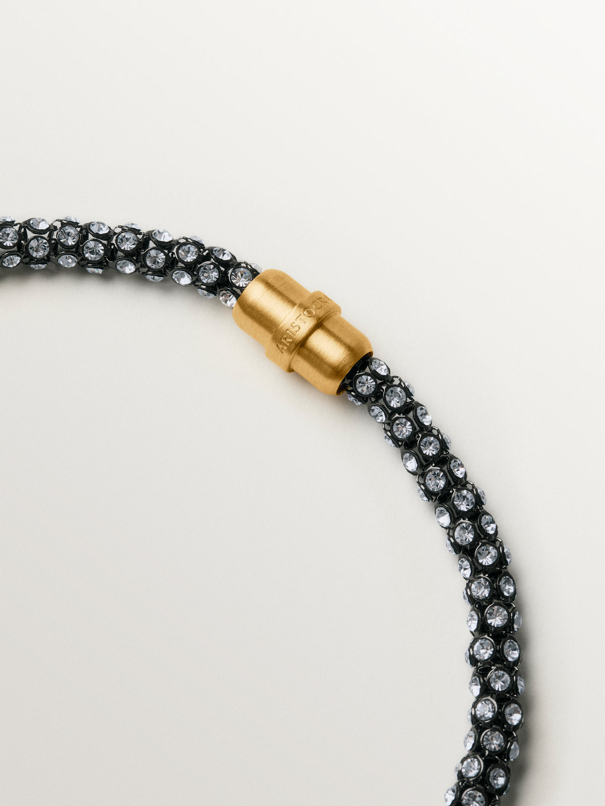 Long tube-shaped necklace with crystals