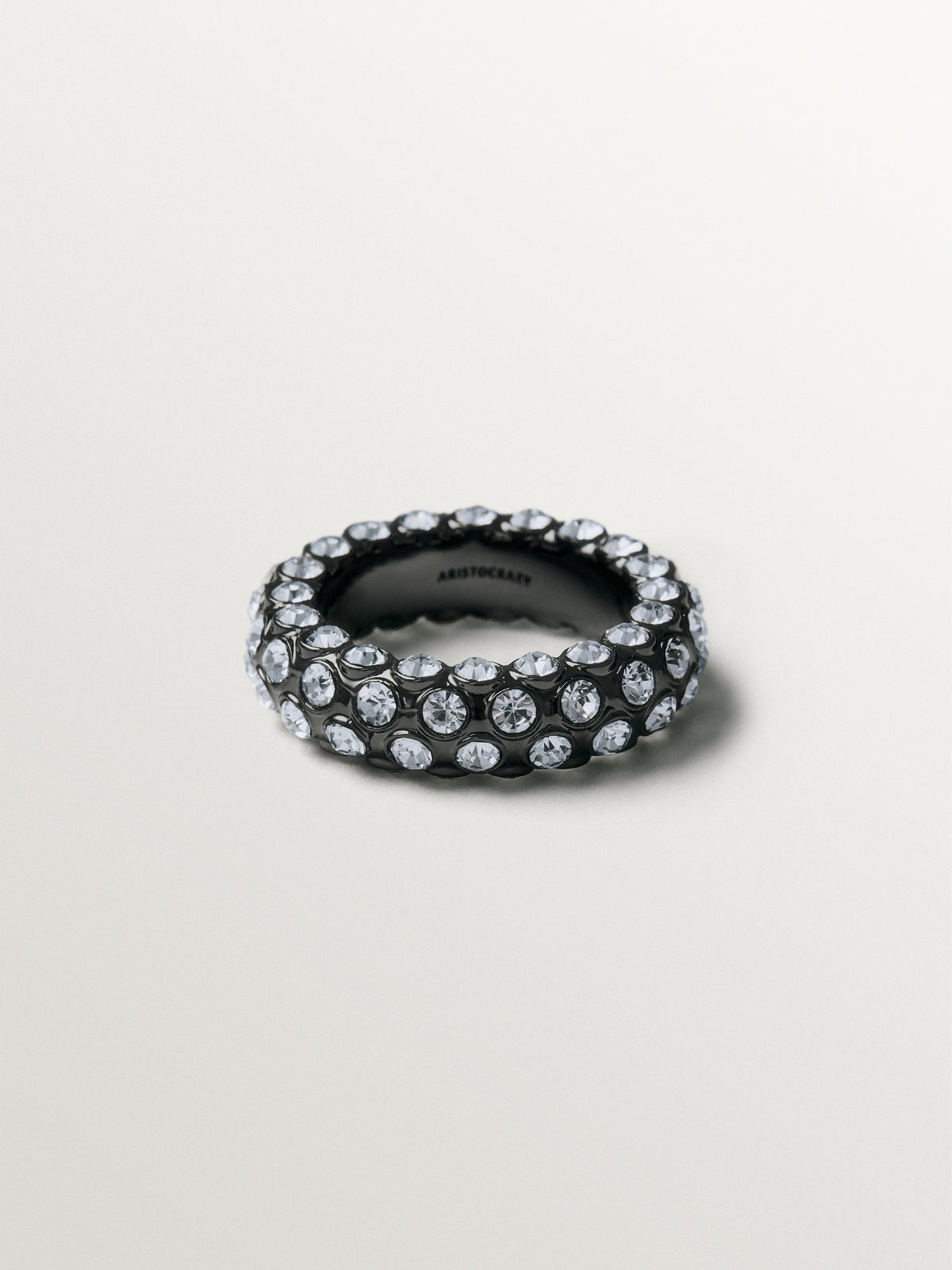 Tube-shaped ring with crystals