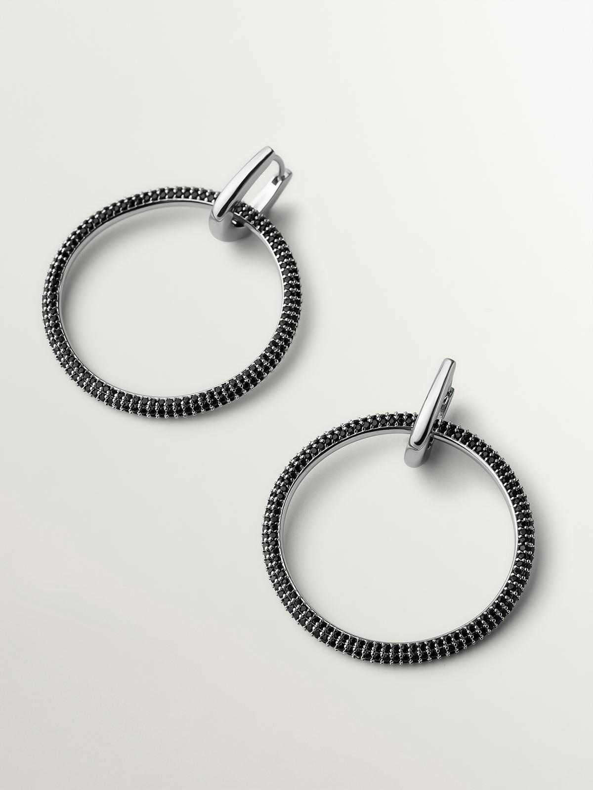 Double hoop earrings with black crystals