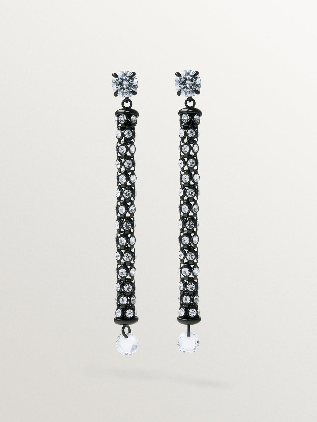 Long tube-shaped earrings with crystals