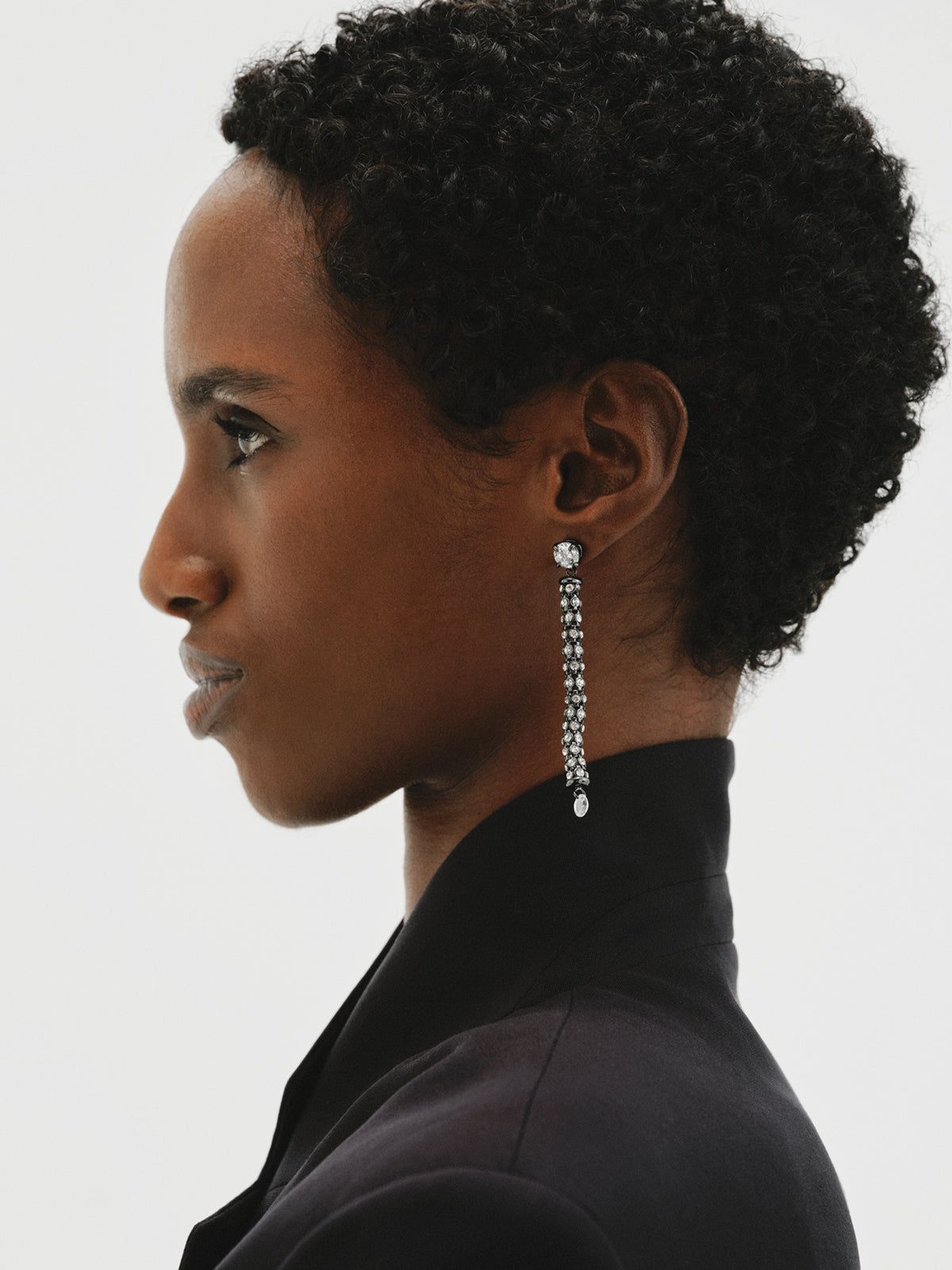 Long tube-shaped earrings with crystals