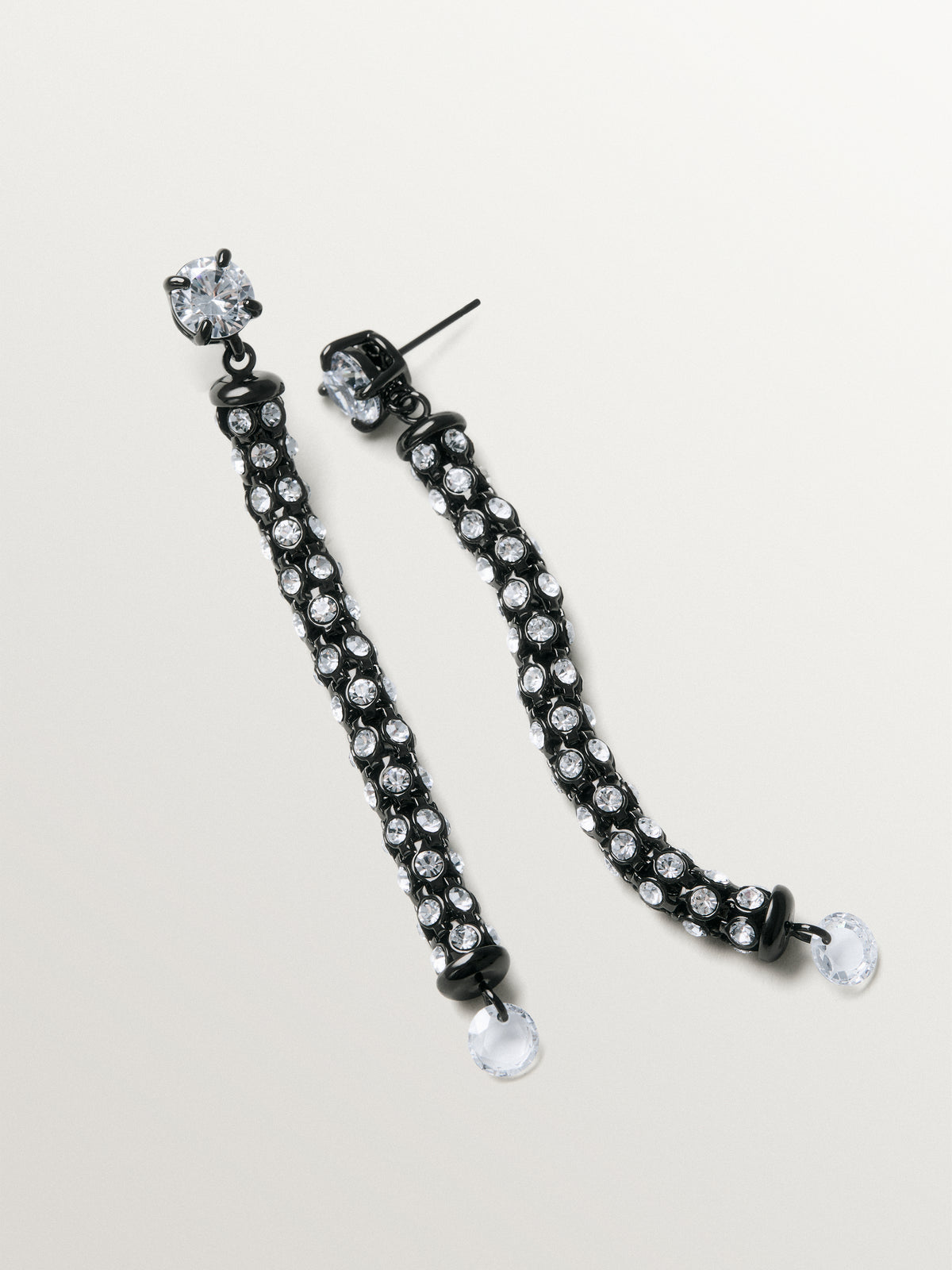 Long tube-shaped earrings with crystals