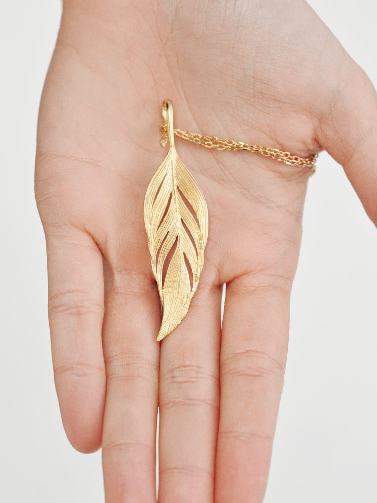 18k gold plated leaf-shaped charm