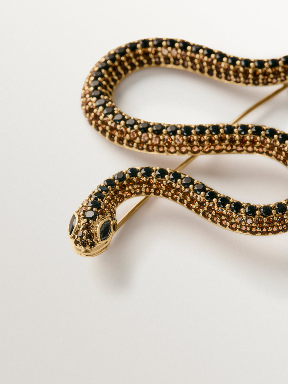 Yellow gold-plated snake brooch with crystals
