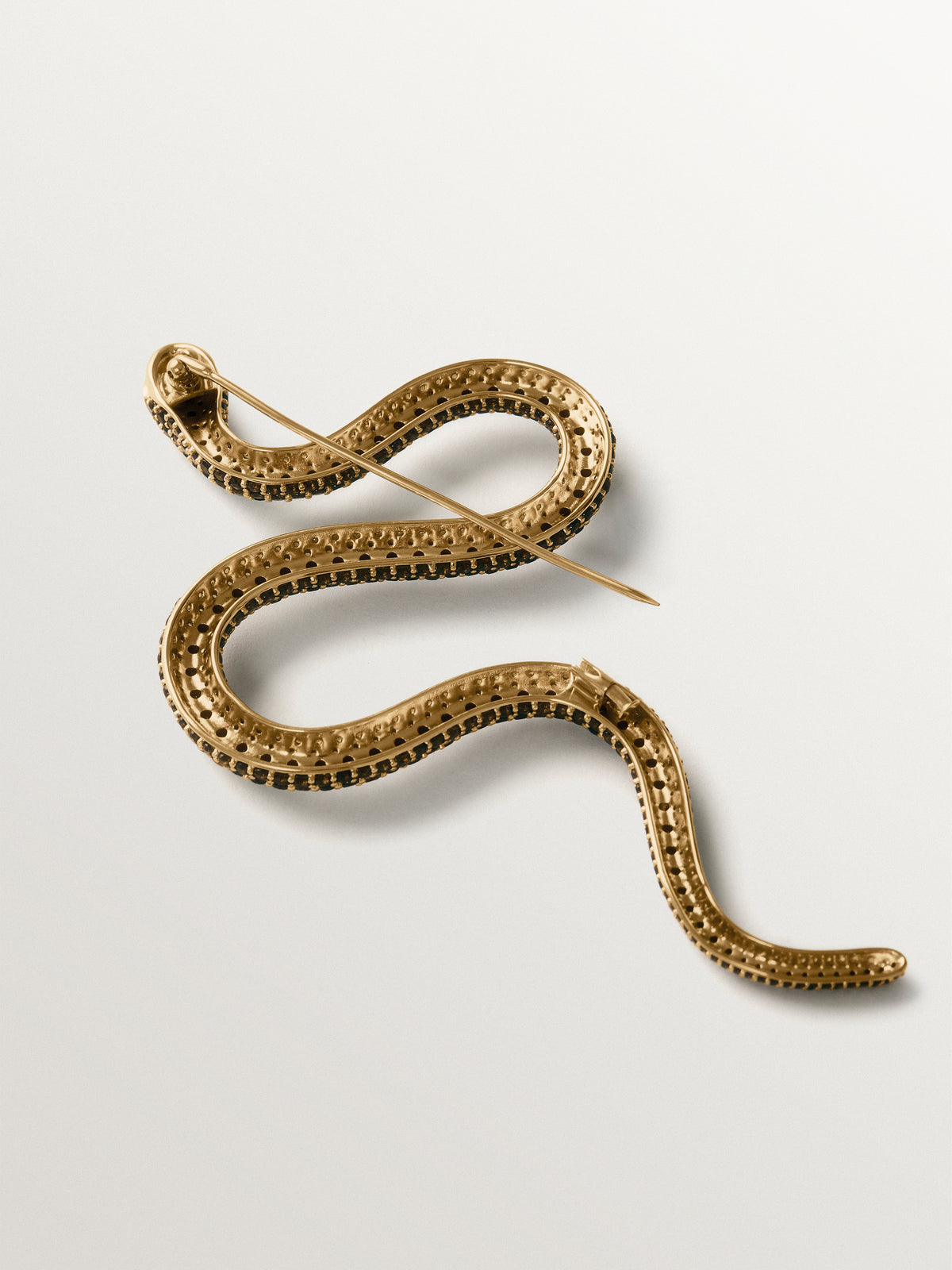 Yellow gold-plated snake brooch with crystals
