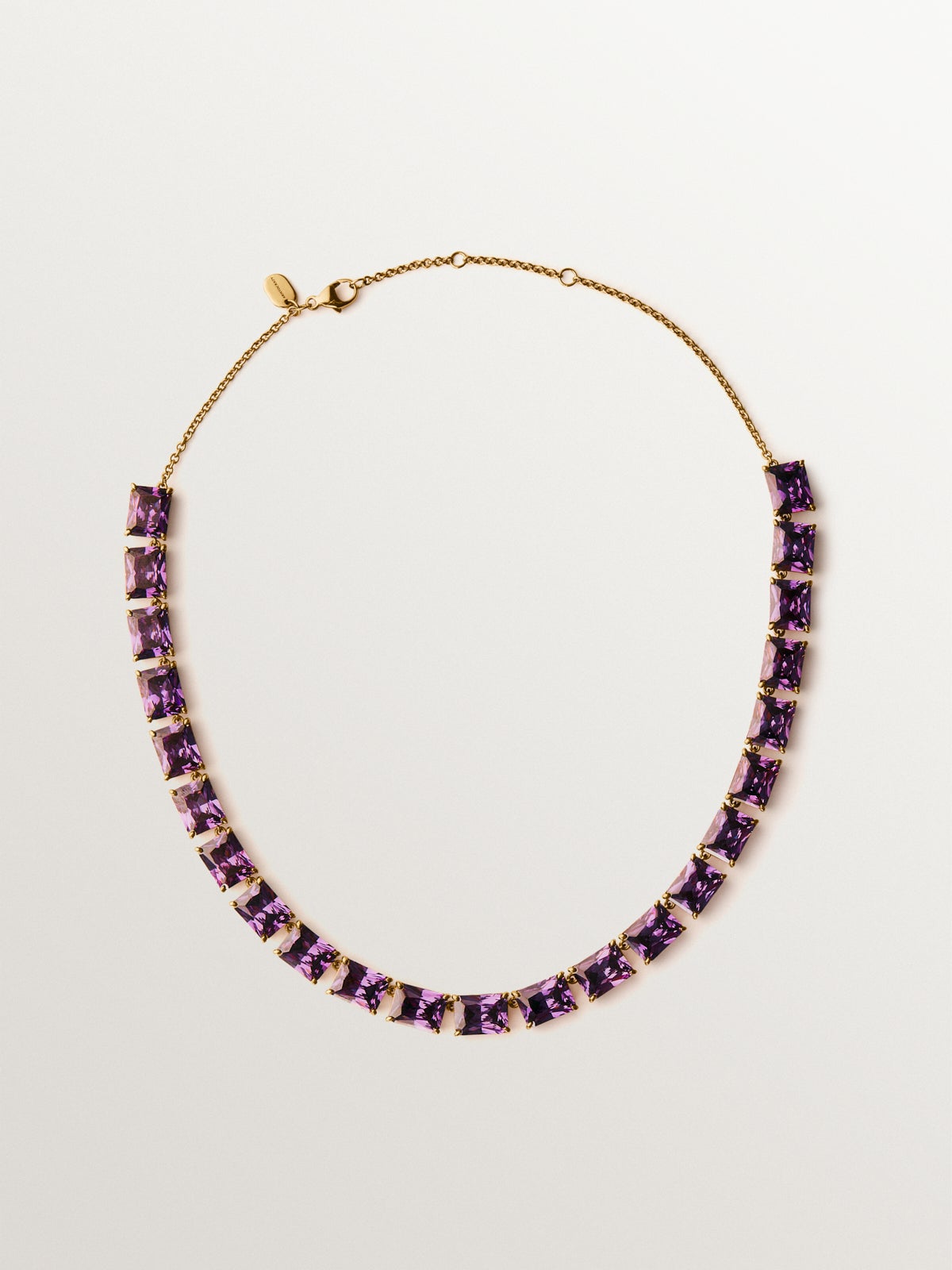 Yellow gold-plated necklace with purple crystals