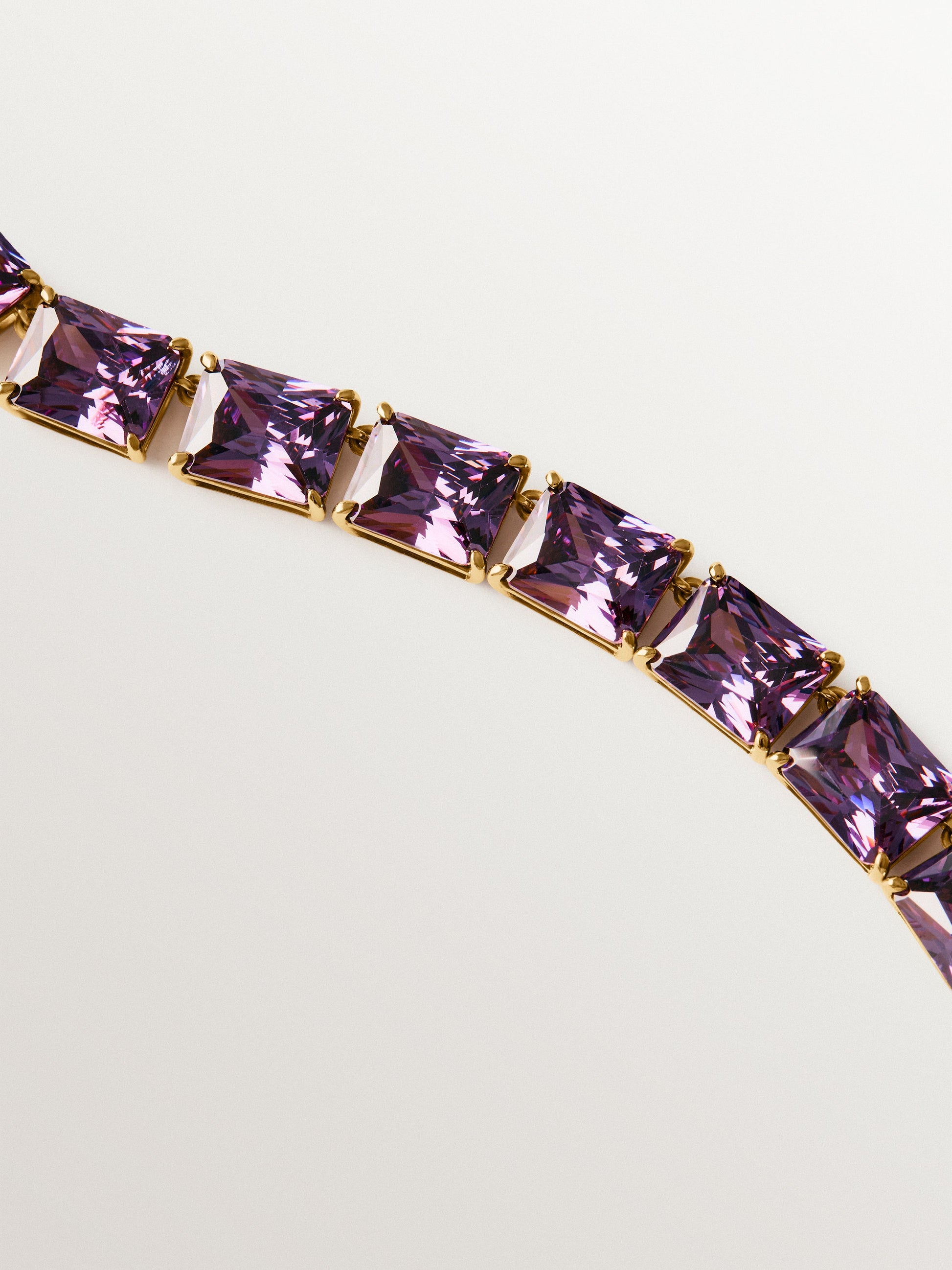 Yellow gold-plated necklace with purple crystals