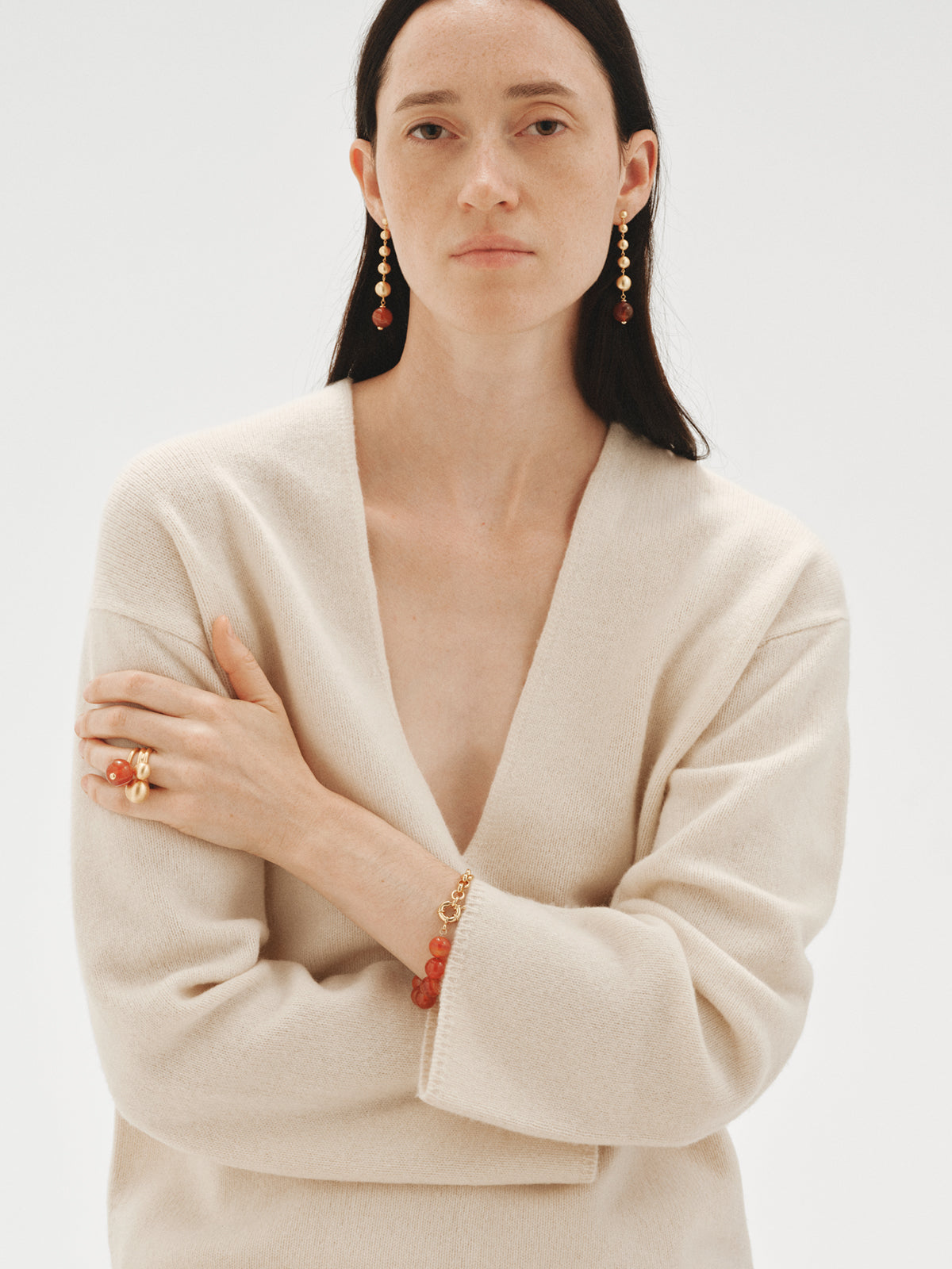 Yellow gold-plated bracelet with red agate and sphere motif