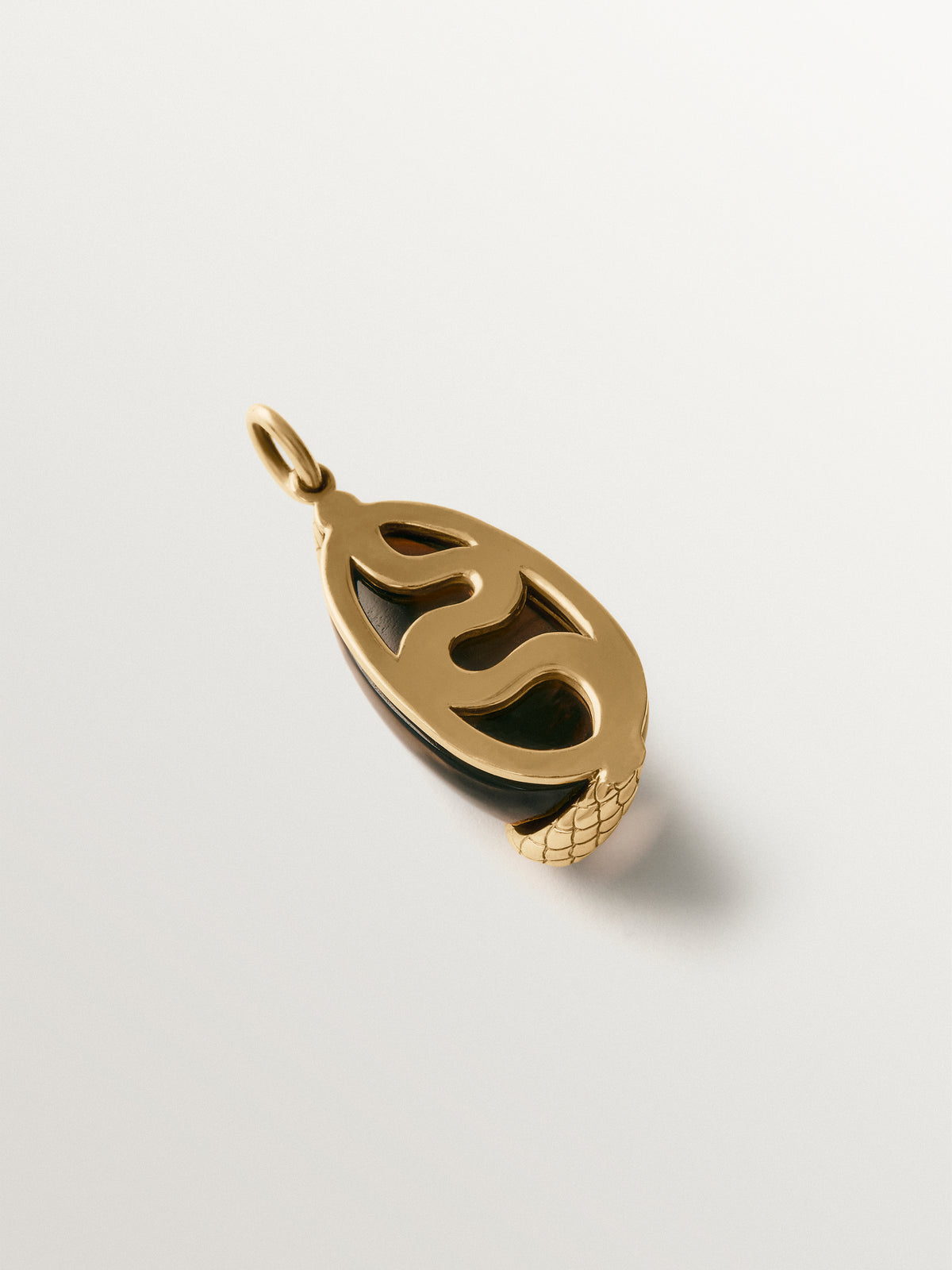 Yellow gold-plated charm with brown crystal and snake motif