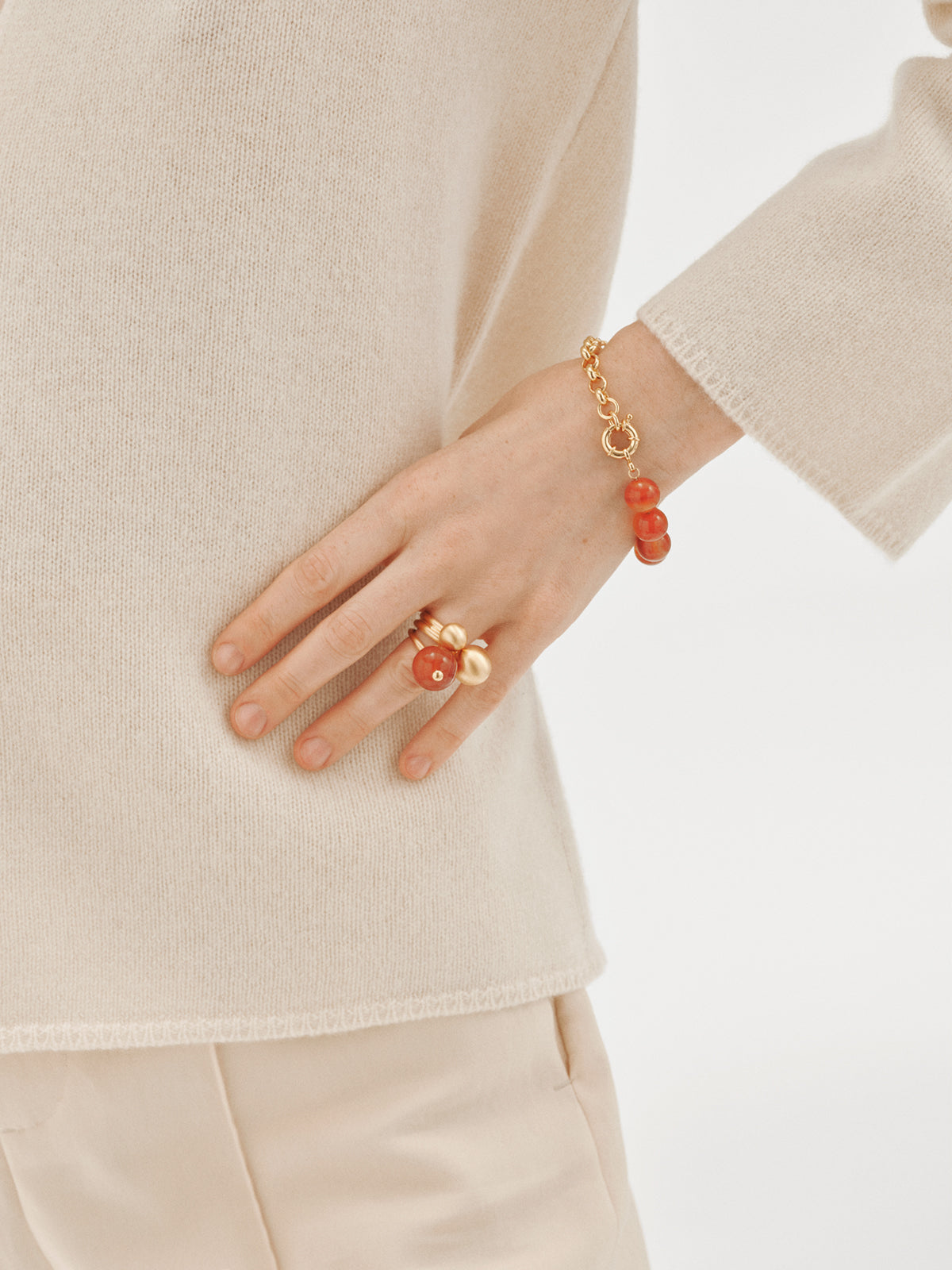 Brushed yellow gold-plated ring with two-sphere motif