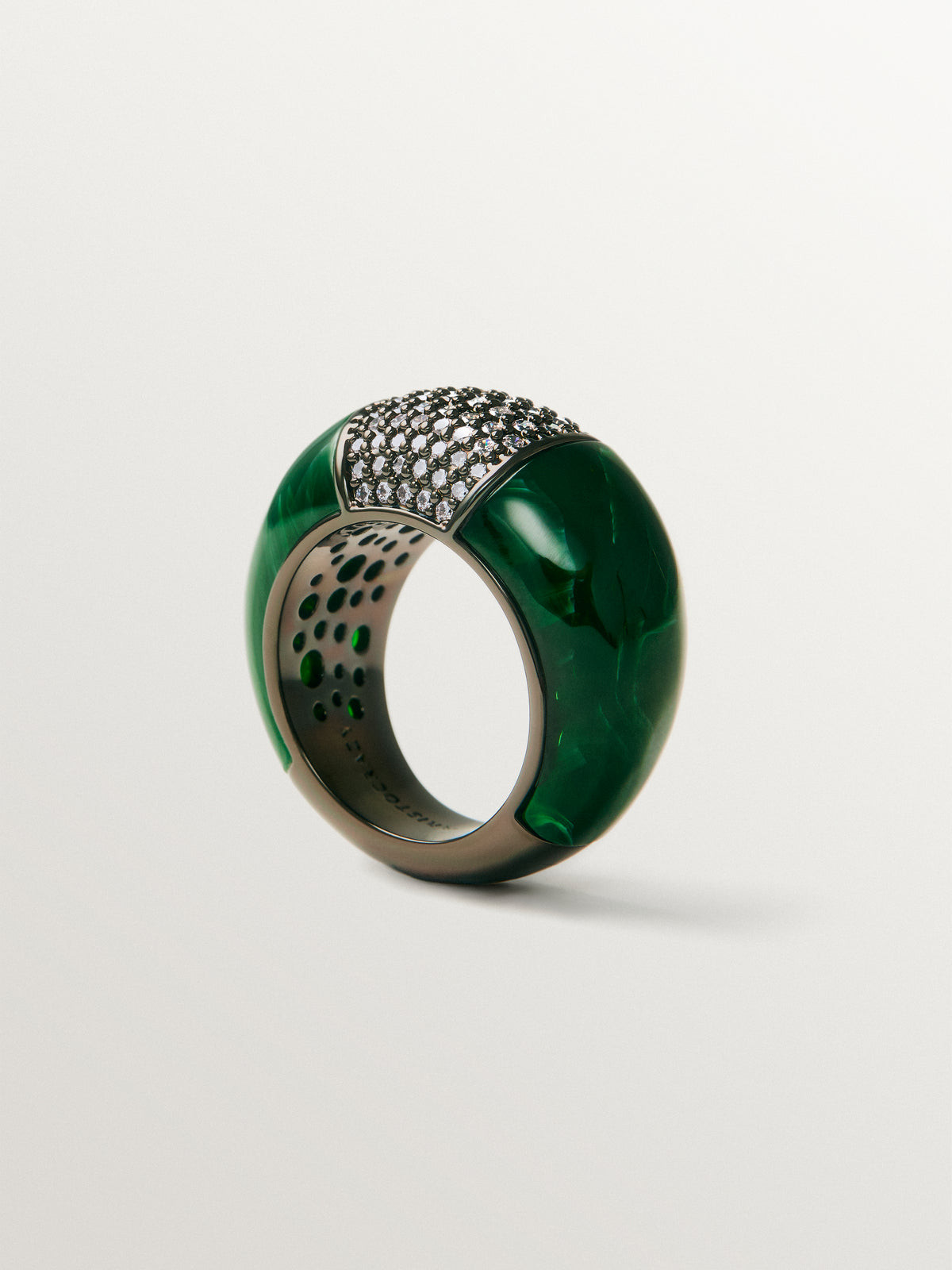 Domed ring with green resin and crystals