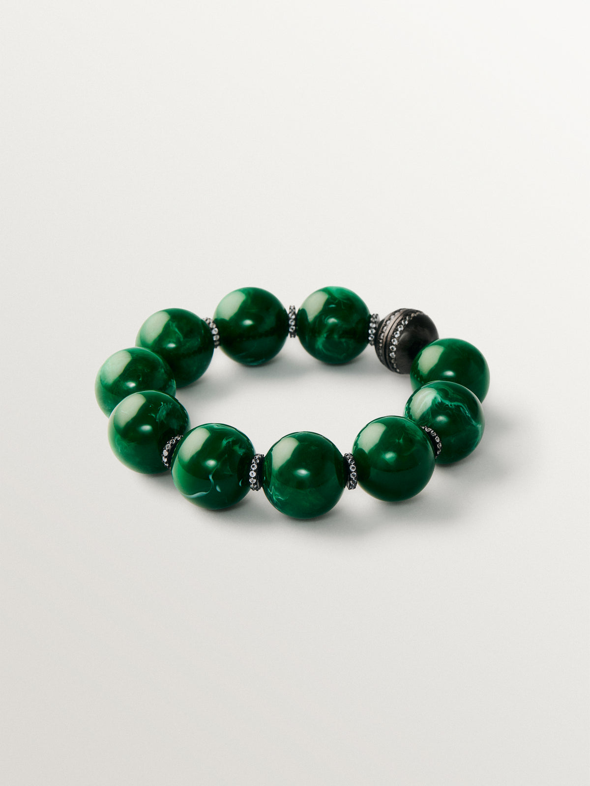 Bracelet with green resin, crystals and sphere motifs