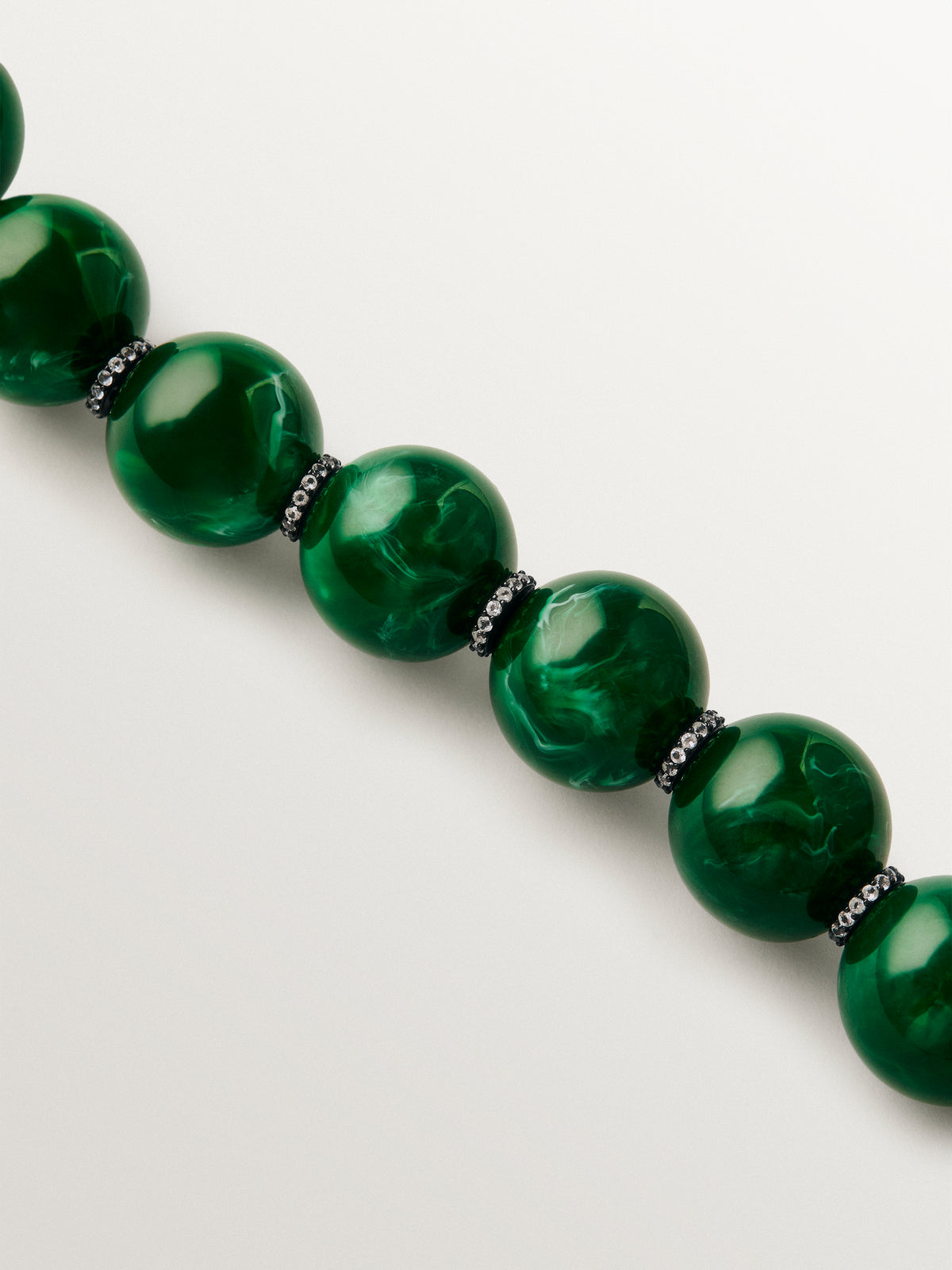 Bracelet with green resin, crystals and sphere motifs