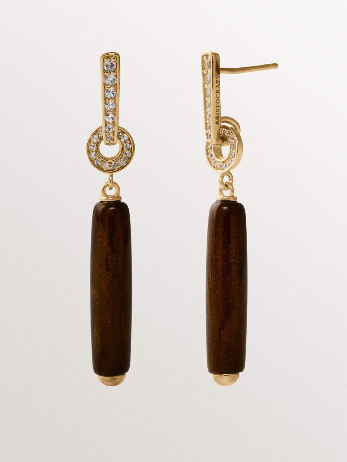 18K yellow gold-plated long earrings with brushed finish, brown resin and crystals