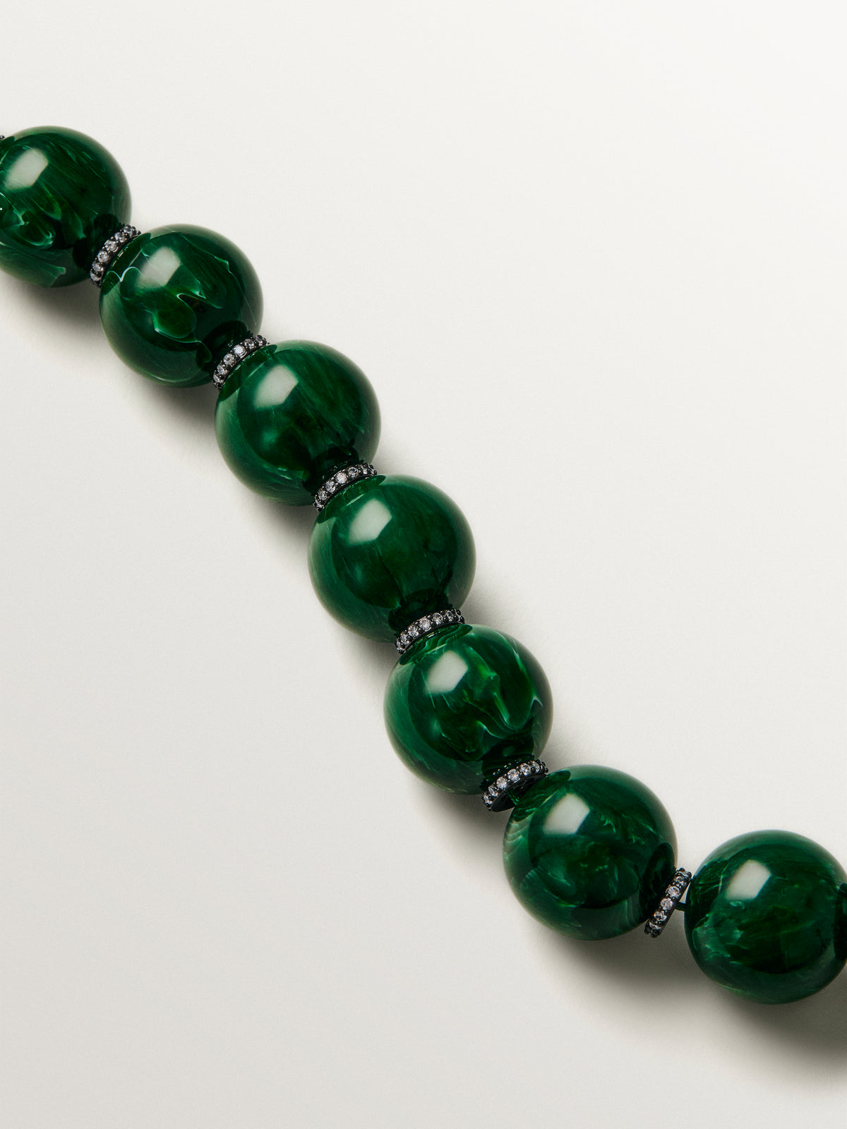 Necklace with green resin, crystals and sphere motifs
