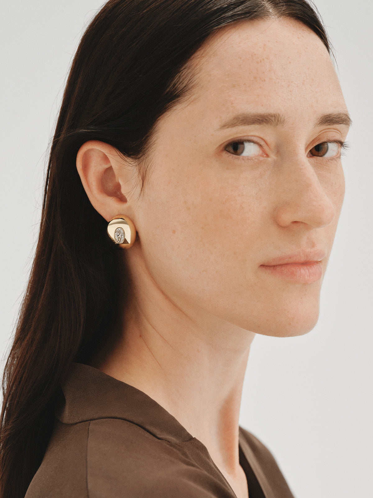 Yellow gold-plated hoop earrings with crystals