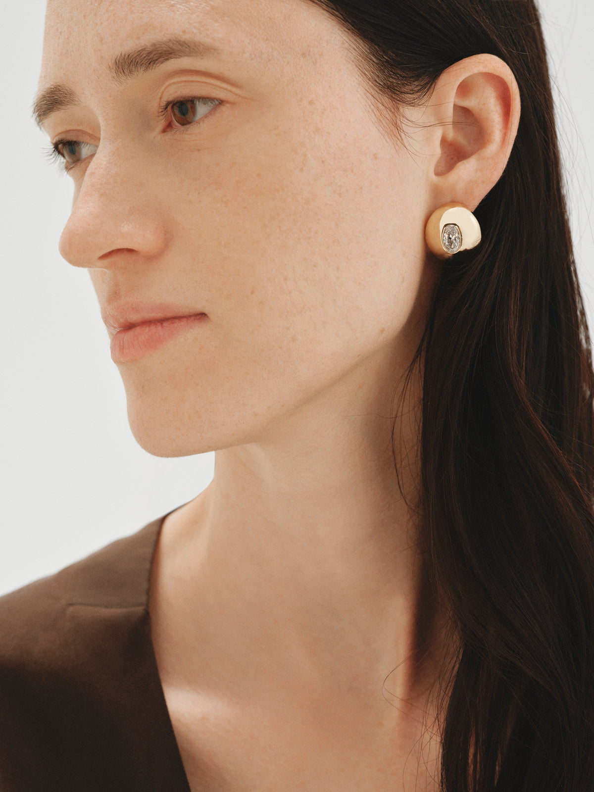 Yellow gold-plated hoop earrings with crystals