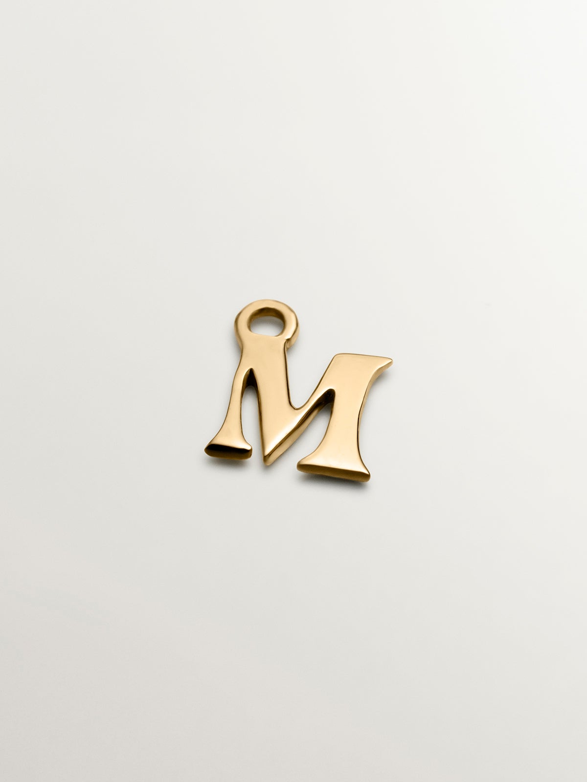 14K yellow gold charm with letter M