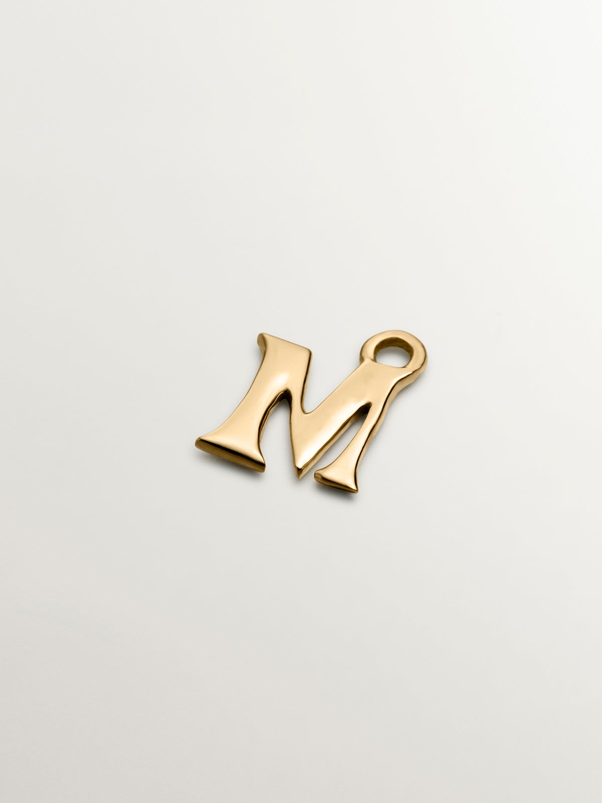 14K yellow gold charm with letter M