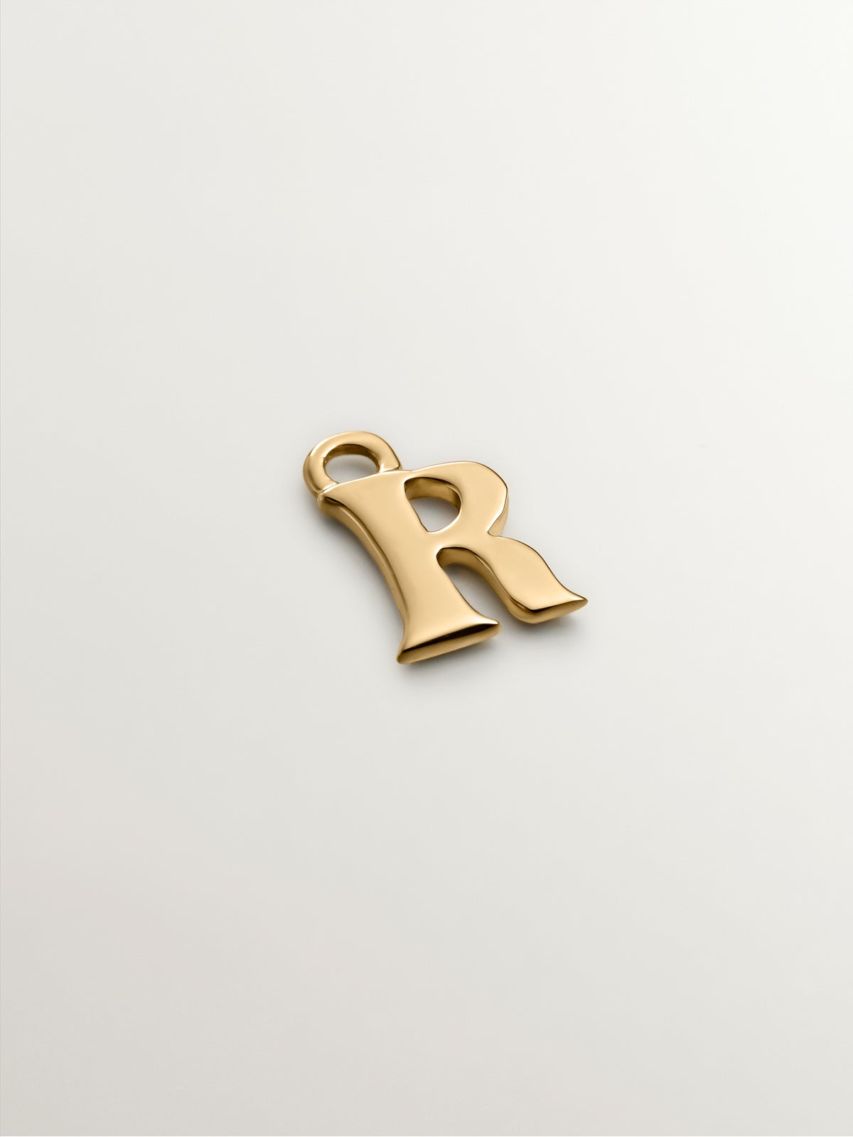 14K yellow gold charm with letter R