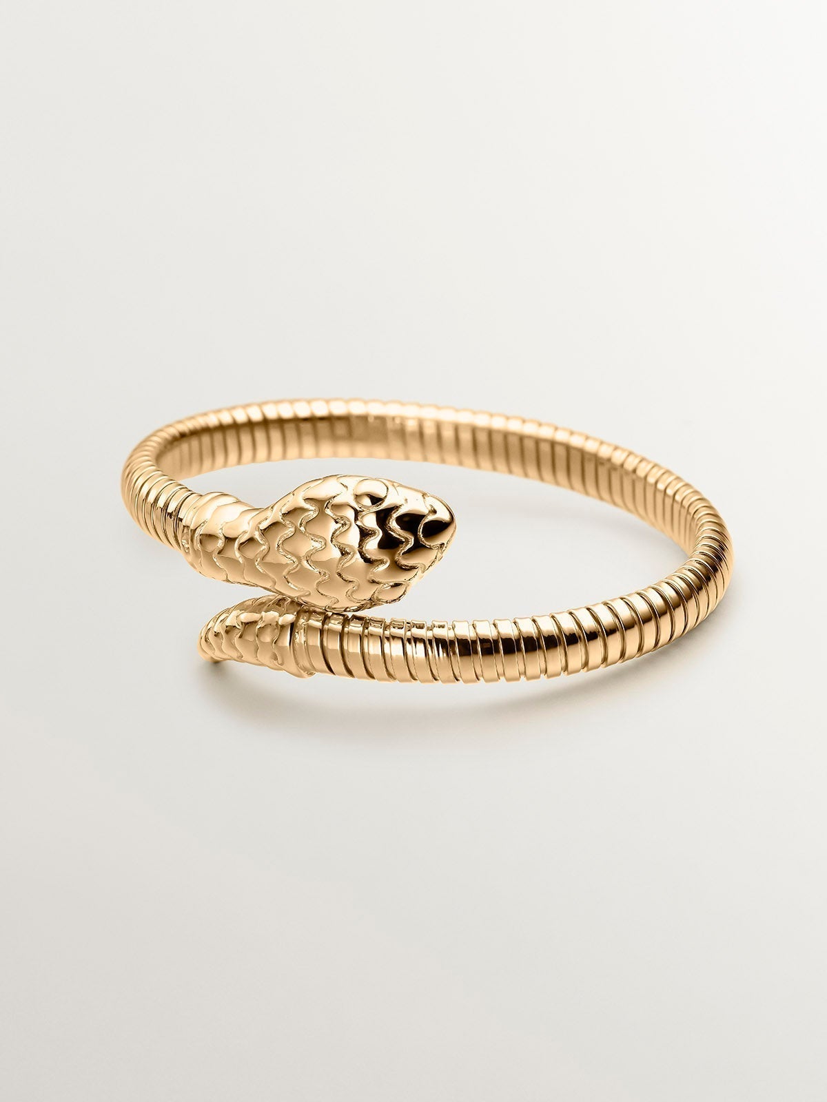 Rigid bracelet in 925 silver plated in 18K yellow gold in the shape of a snake