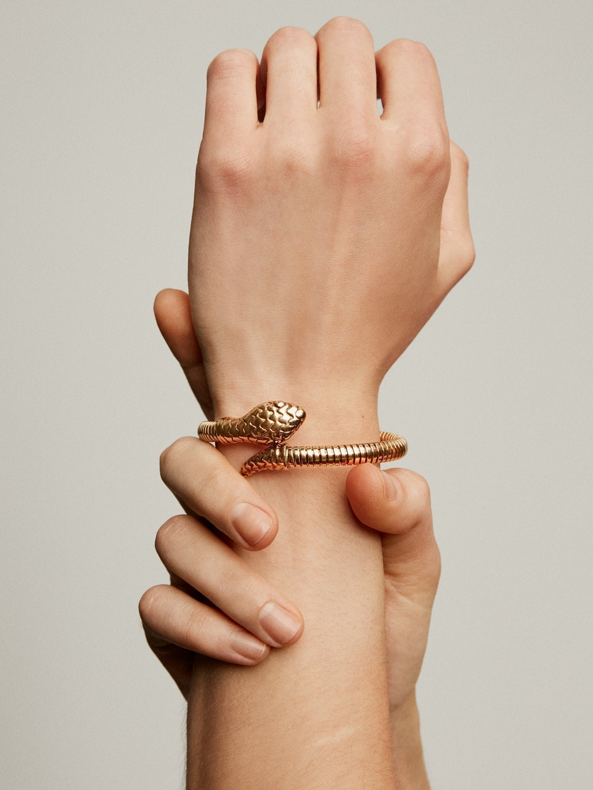 Rigid bracelet in 925 silver plated in 18K yellow gold in the shape of a snake
