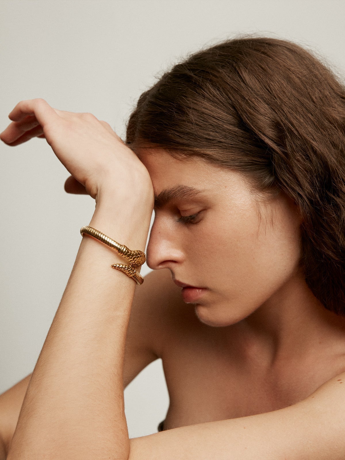 Rigid bracelet in 925 silver plated in 18K yellow gold in the shape of a snake