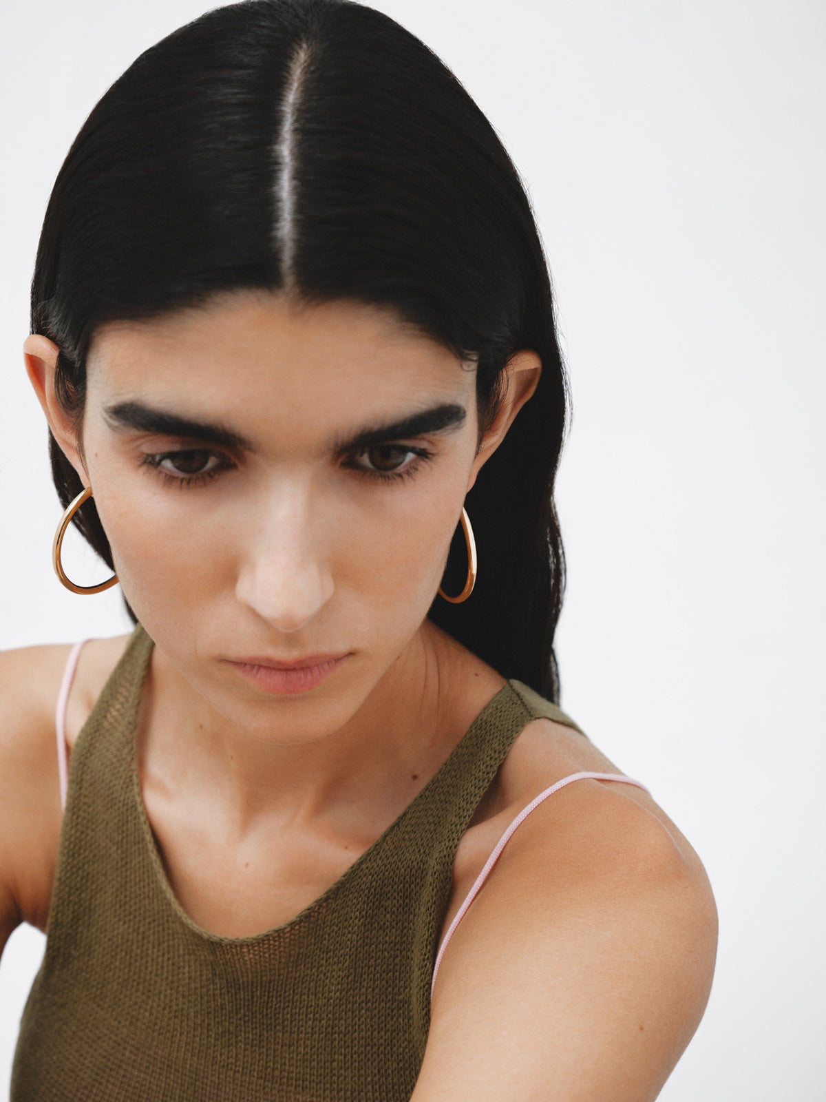 Large hoop earrings made of 925 silver, coated in 18K yellow gold.