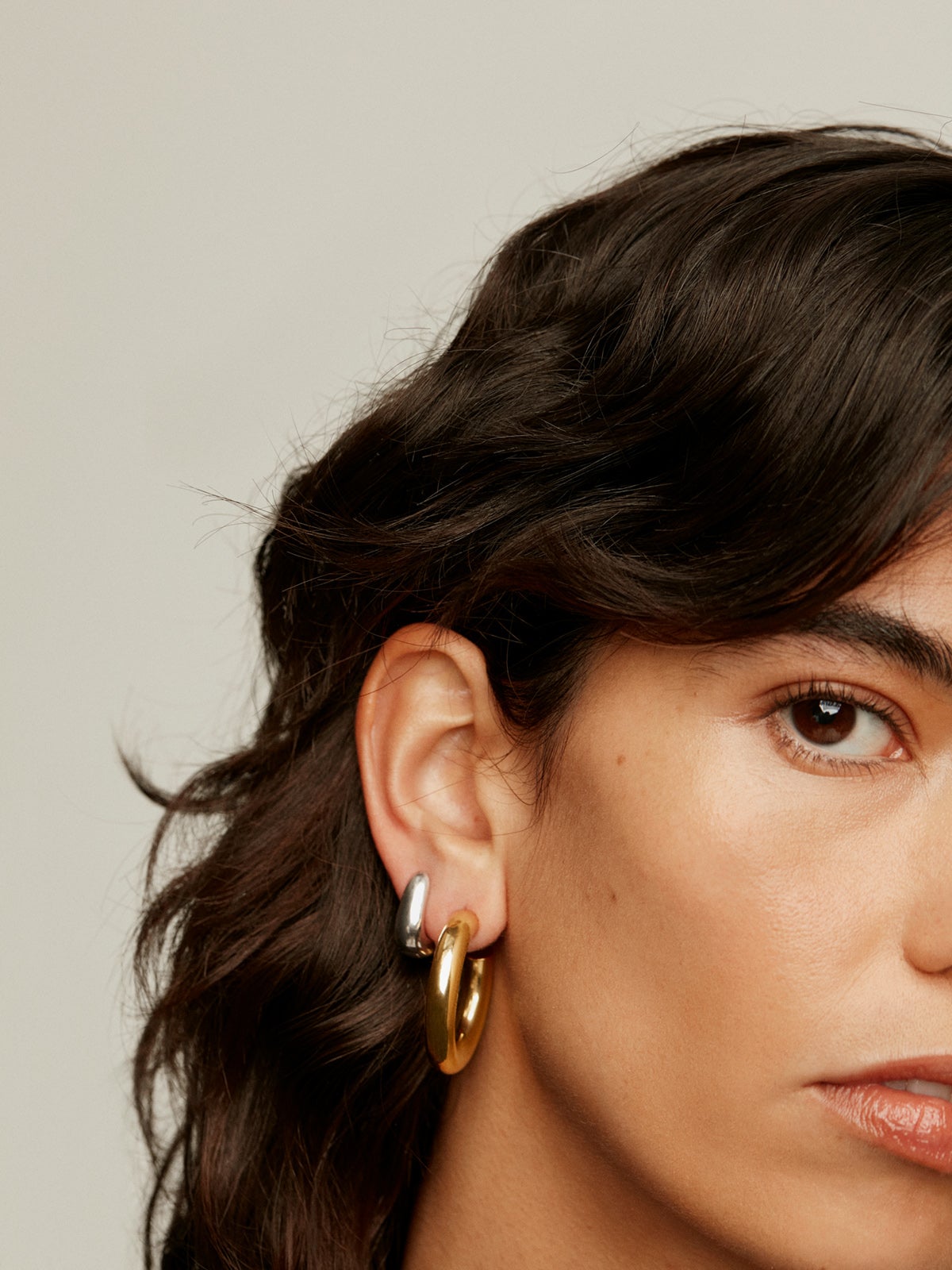 Thick hoop earrings made of 925 silver plated in 18K yellow gold