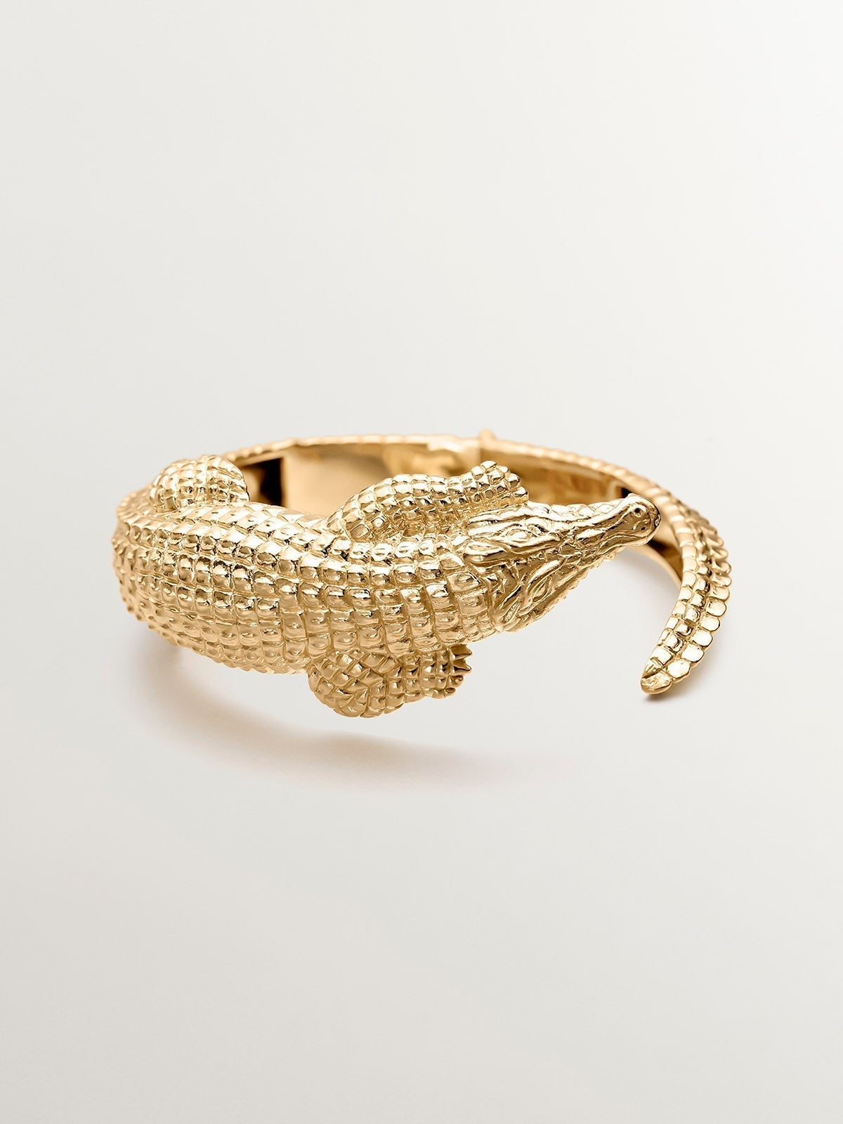 925 Silver bracelet bathed in 18K yellow gold with a crocodile shape.