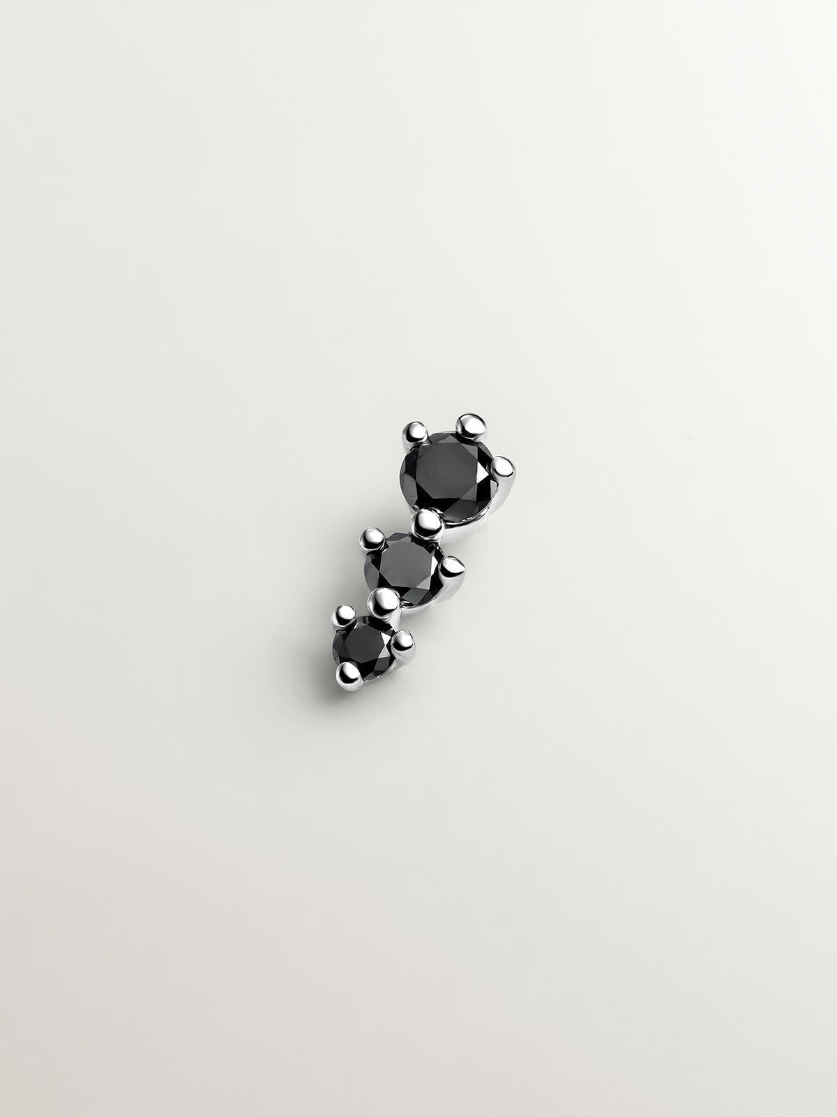 18K white gold piercing with black diamonds