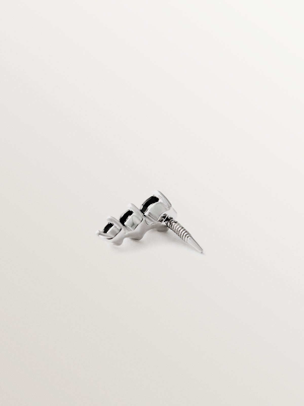 18K white gold piercing with black diamonds