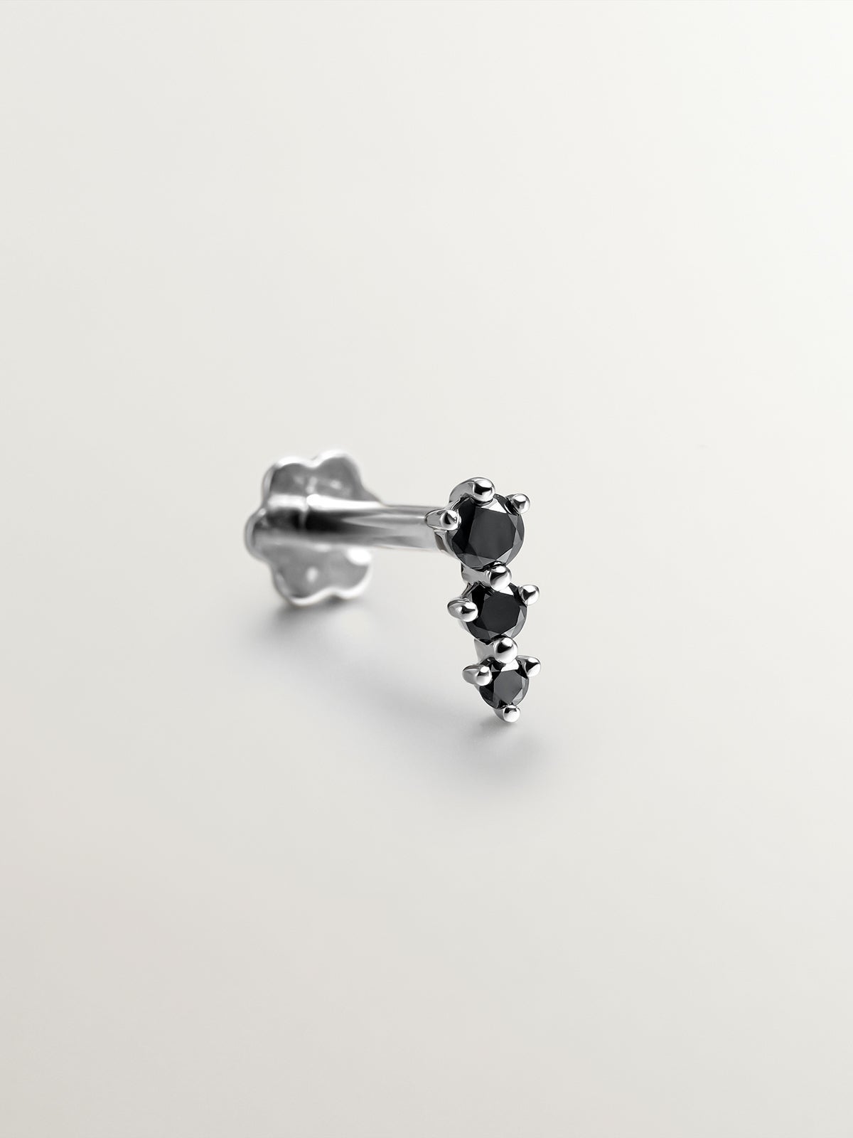 18K white gold piercing with black diamonds